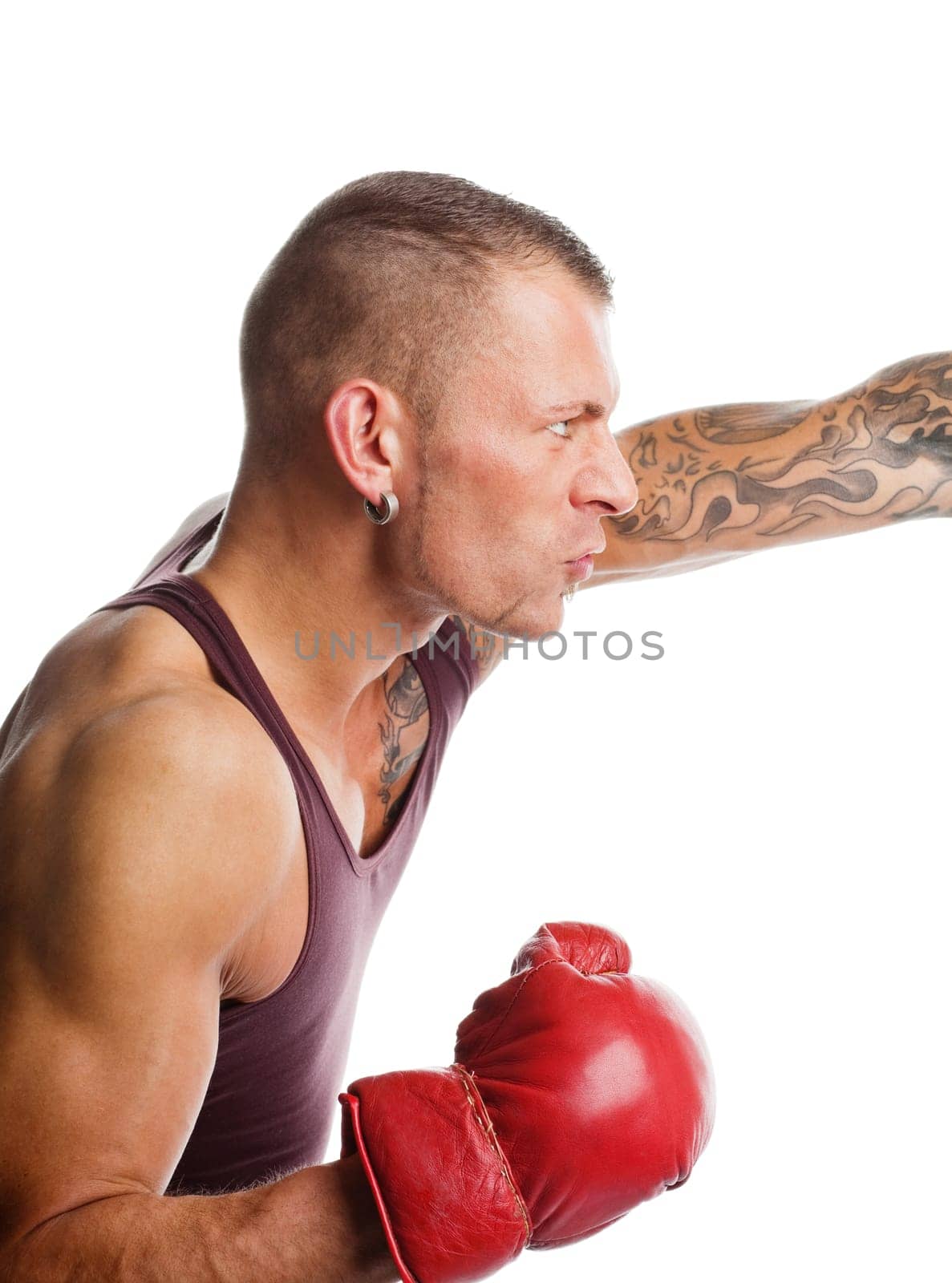 Young muscular man boxing  isolated on white background