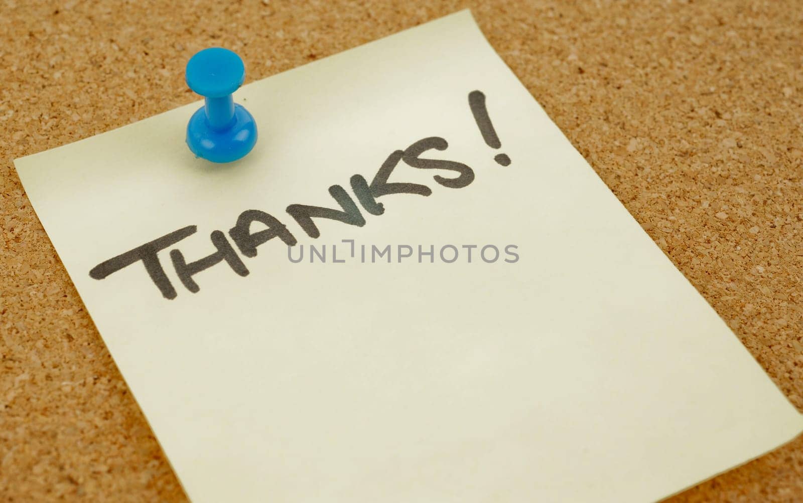 great image of a thankyou note pinned to a corkboard