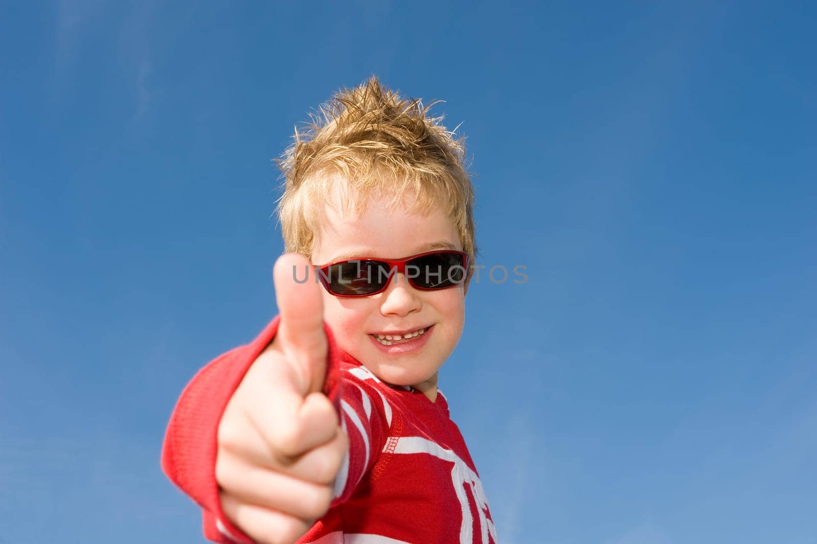 boy with thumb up