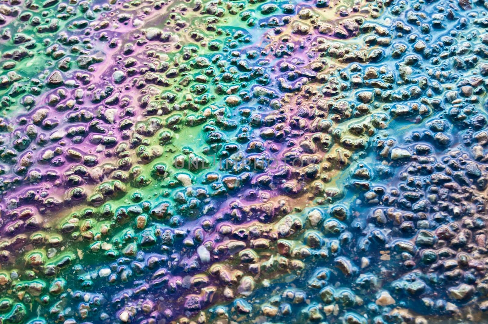 Fuel puddle on the asphalt