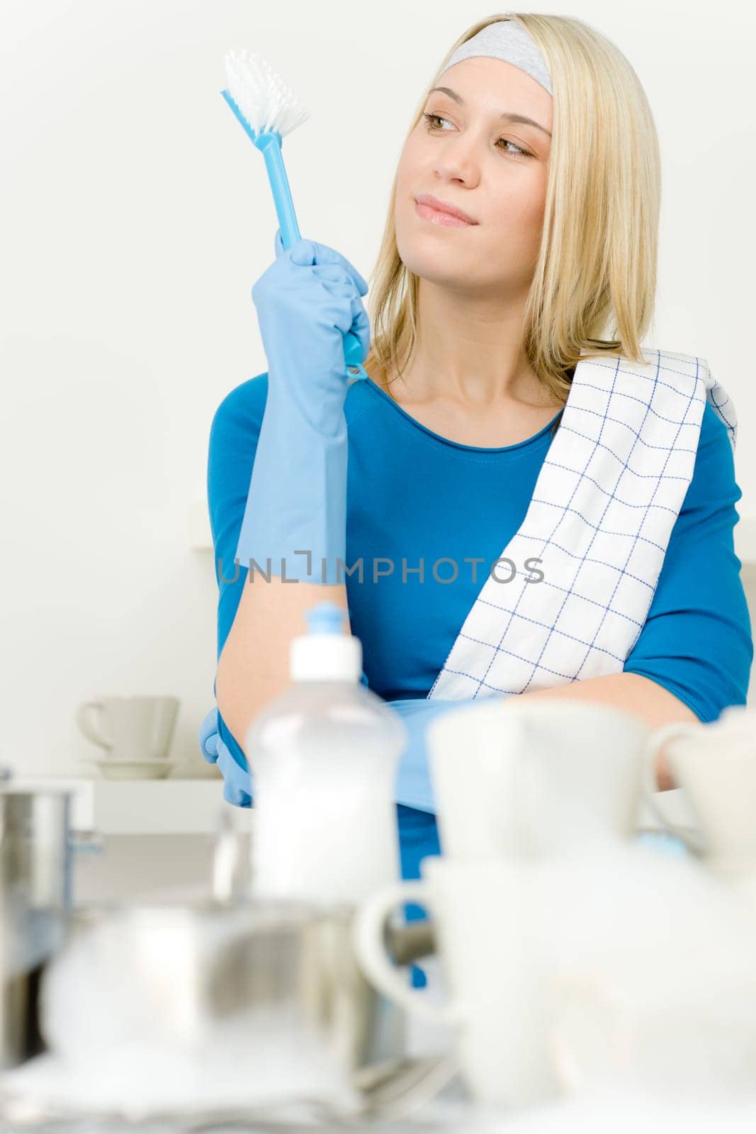 Modern kitchen - happy woman washing dishes, housework