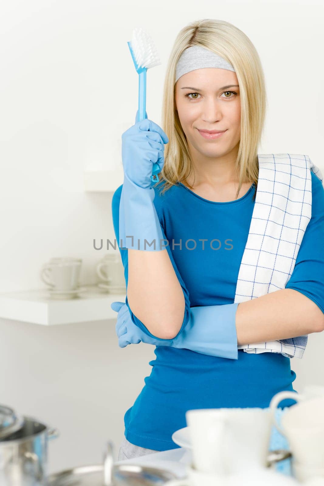Modern kitchen - happy woman washing dishes, housework