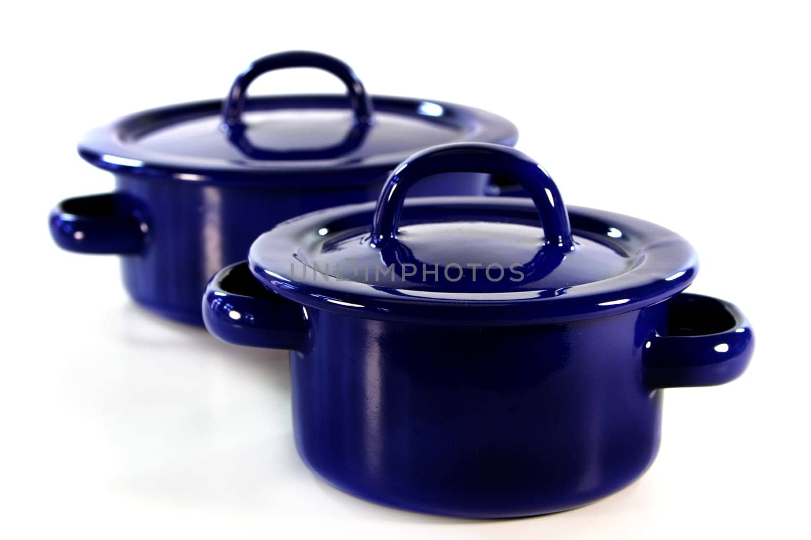 a blue cooking pot against a white background
