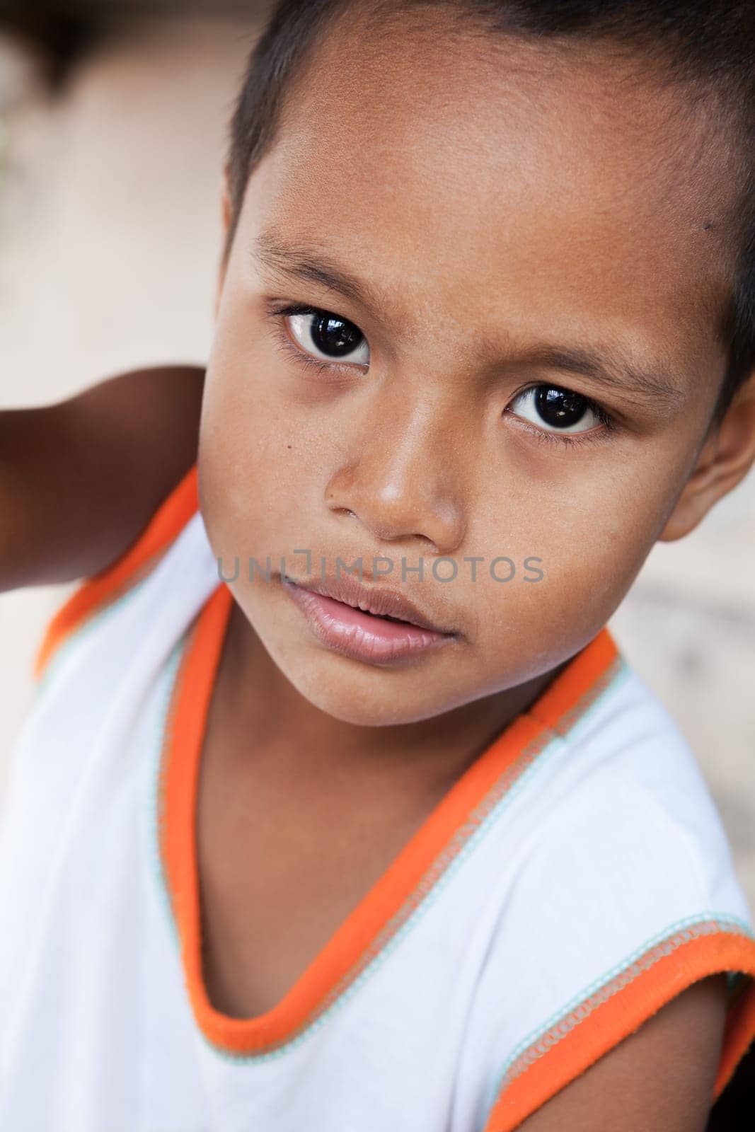 Young Asian boy portrait - Filipino child from impoverished area in the Philippines
