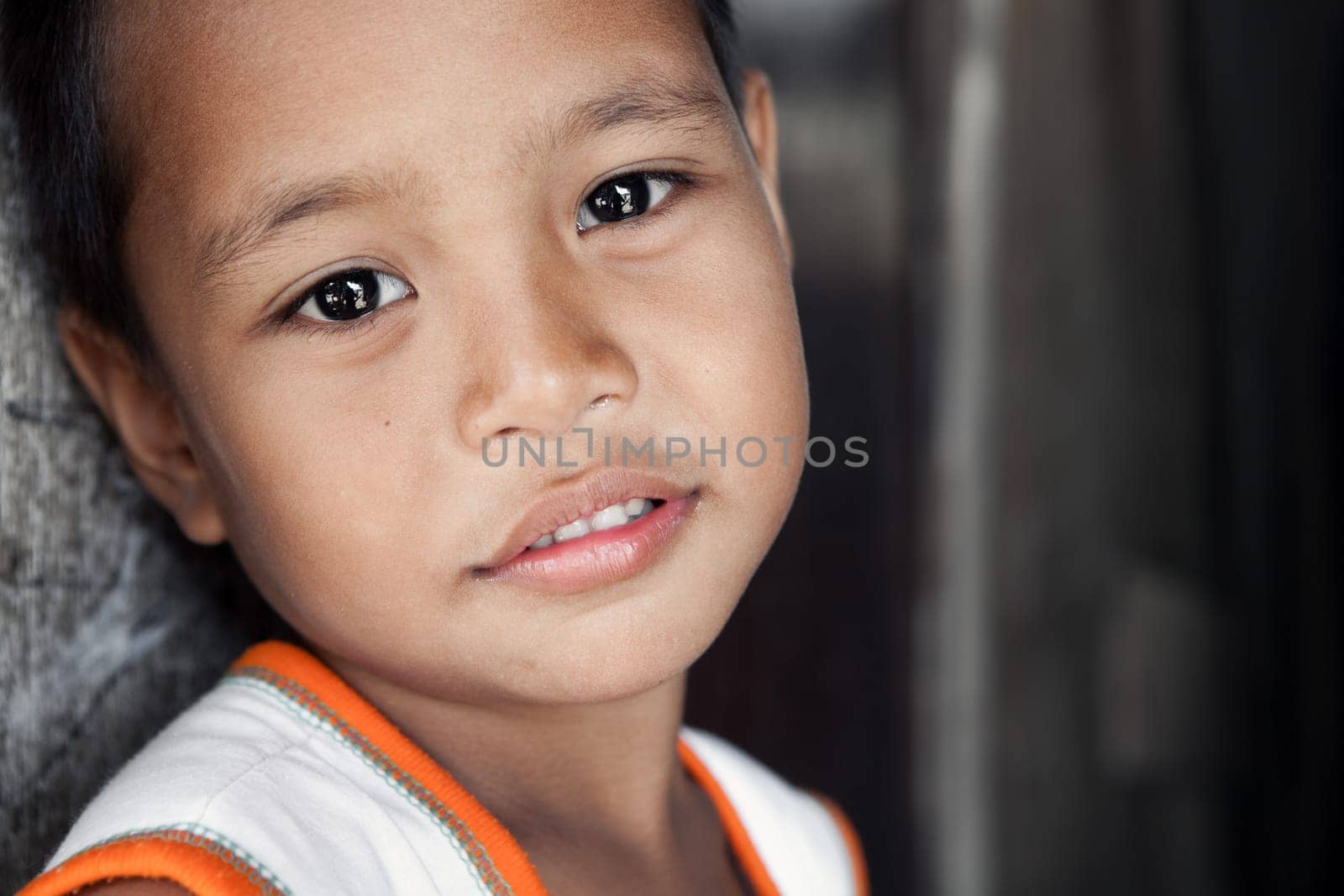 Young Asian boy portrait - Filipino child from impoverished area in the Philippines