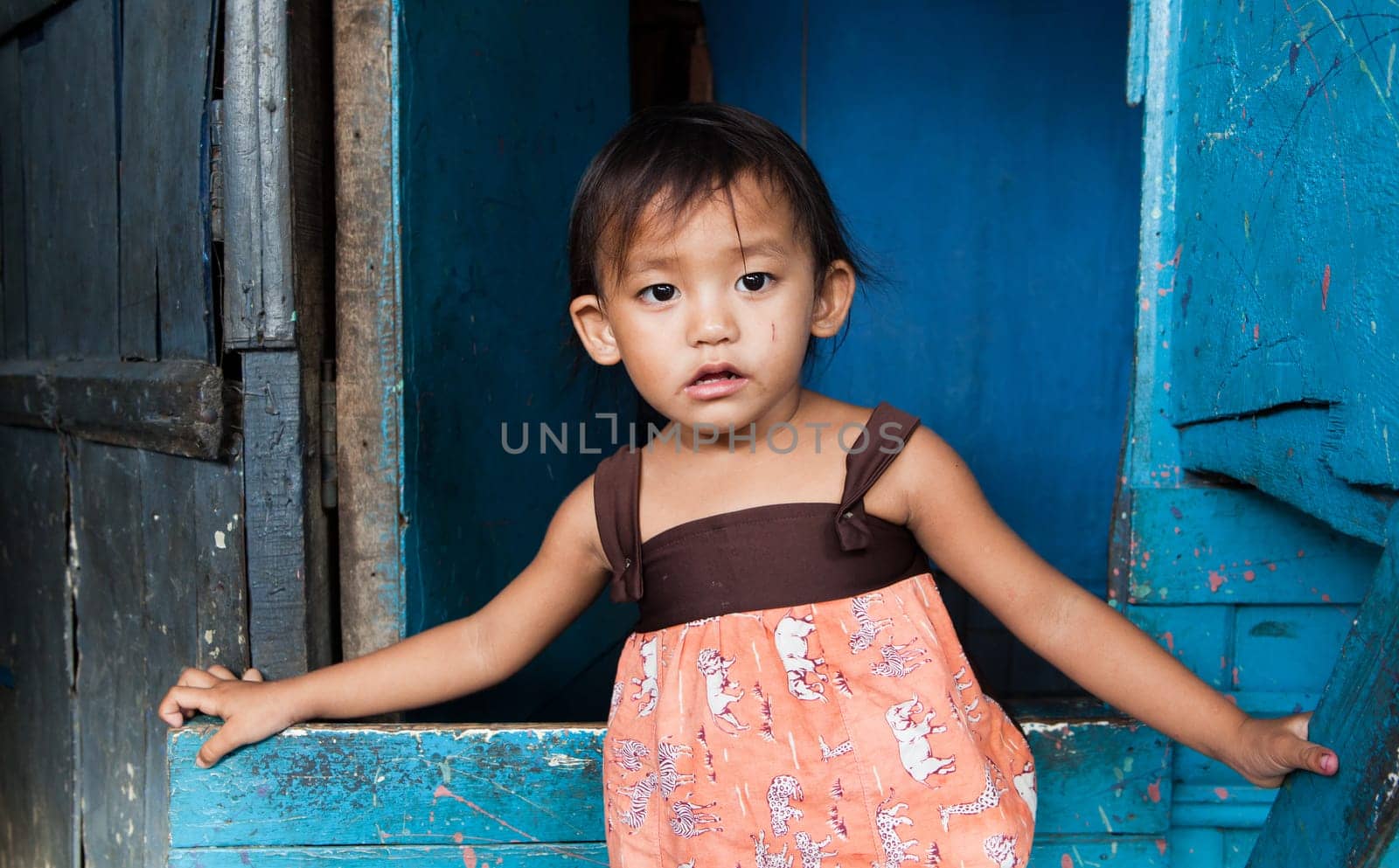 Adorable young girl living in poverty. Manila, Philippines.