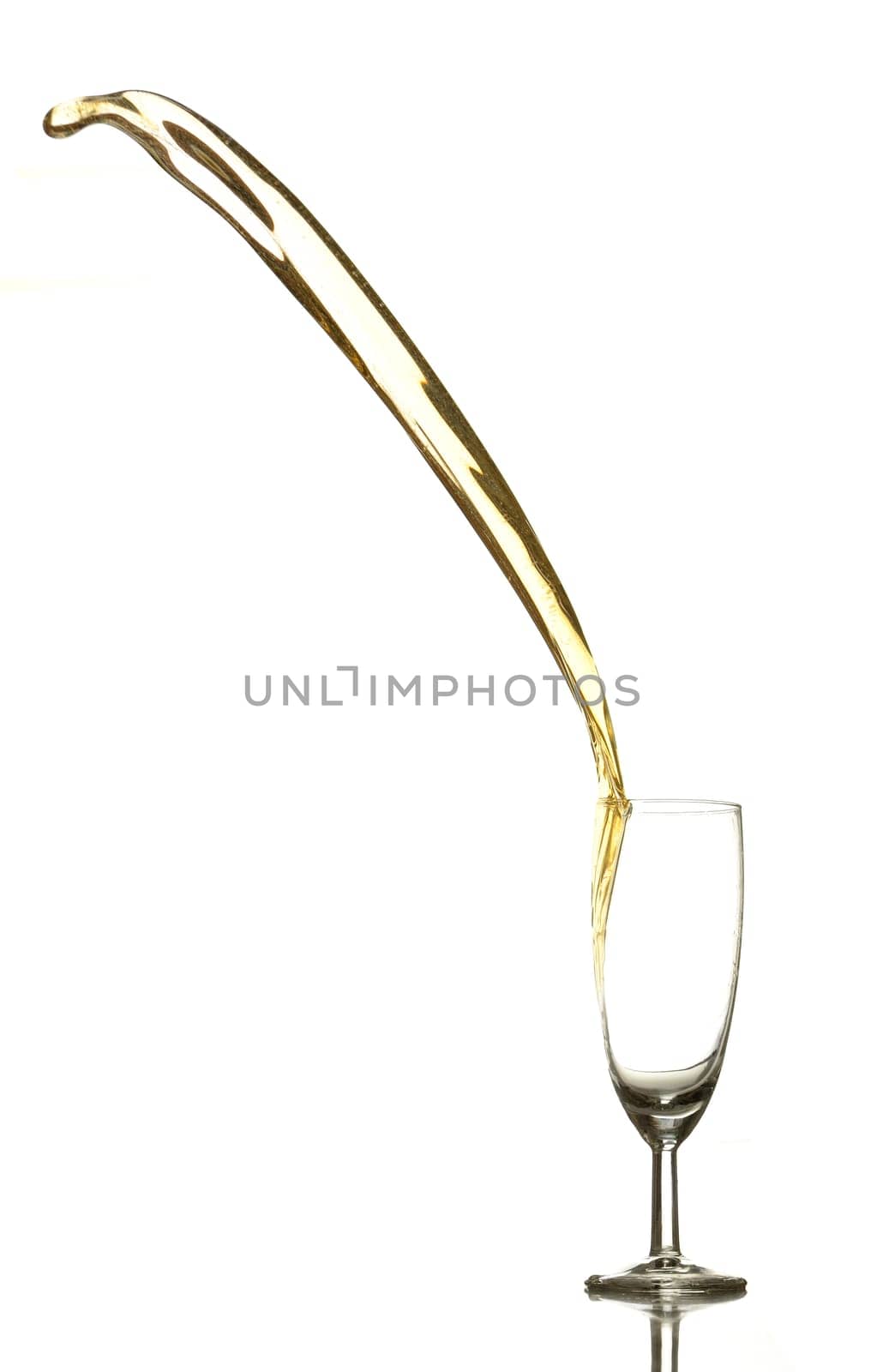 Colored liquid splashing out on a white background