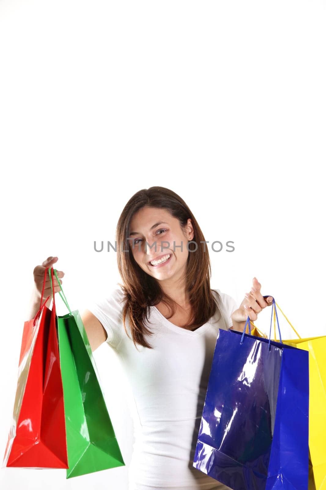 Young happy woman with colorful shopping bags - clipping
