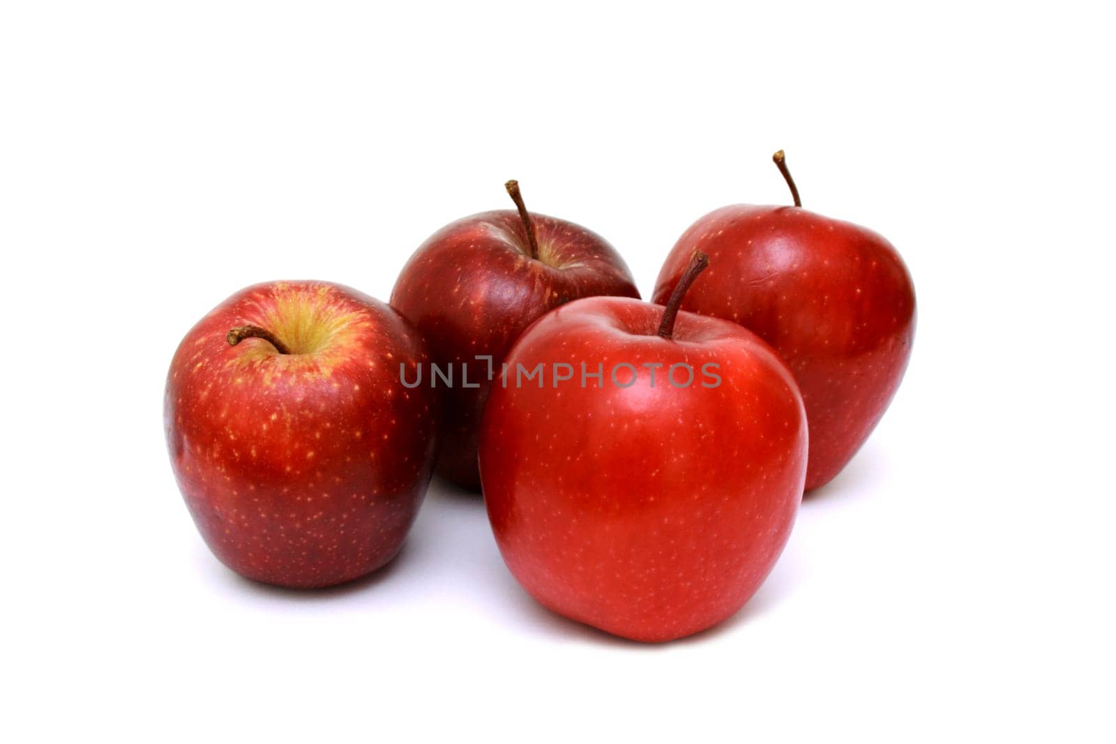 Fresh red apples isolated on white background
