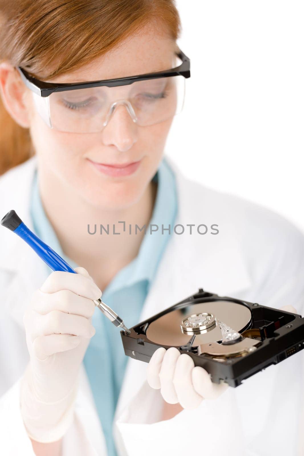 Female computer engineer - IT woman repair hard disc defect