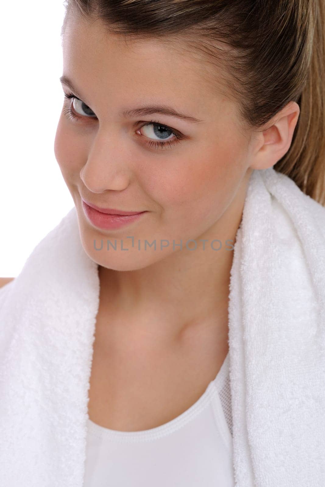 Fitness - young sportive woman on white wearing fitness clothes