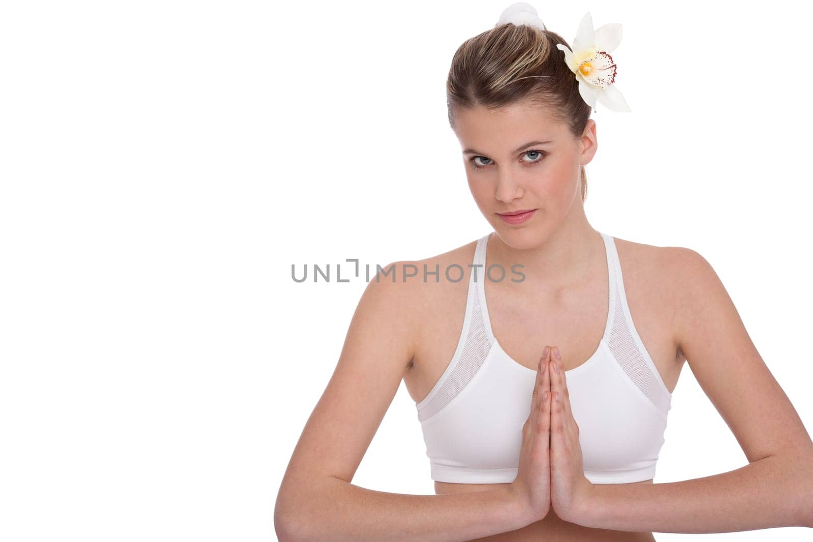 Fitness - Young woman in yoga position on white background relaxing