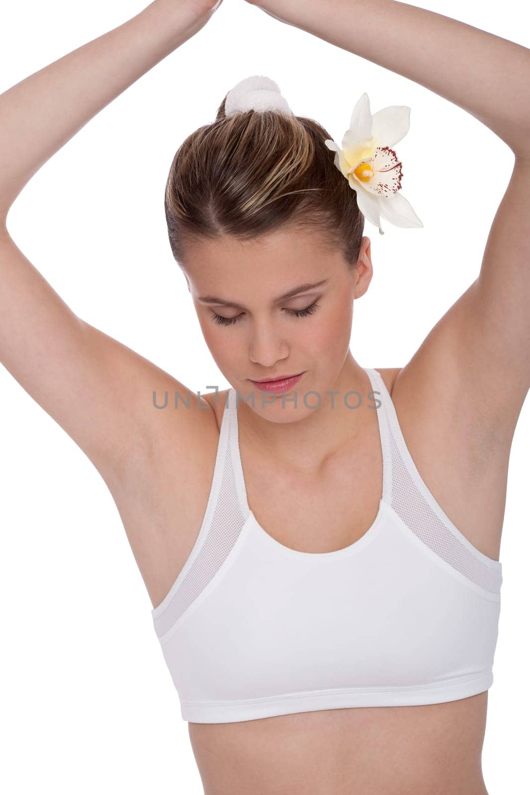 Fitness - Young woman in yoga position on white background relaxing