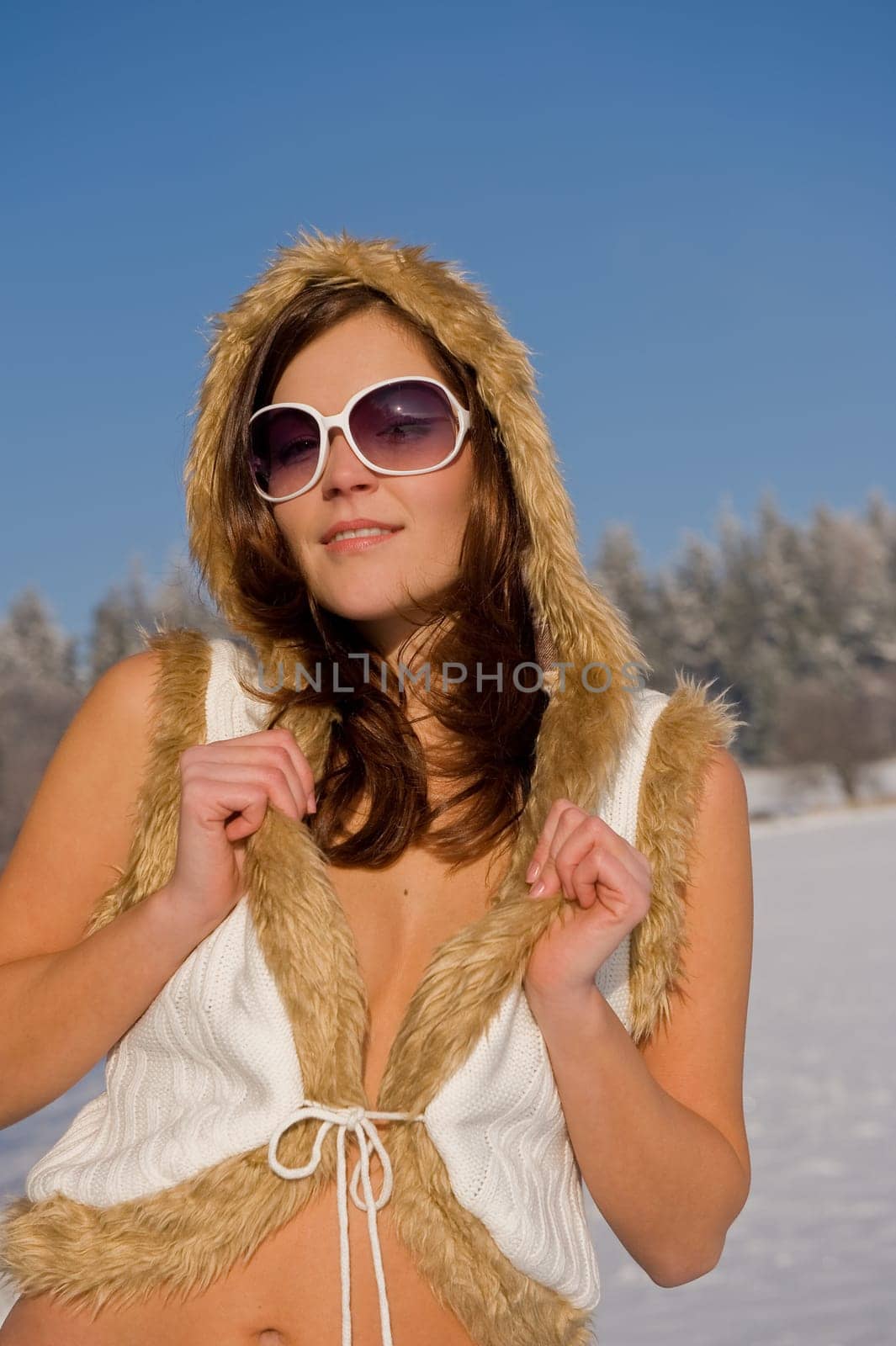Portrait of brunette in winter nature