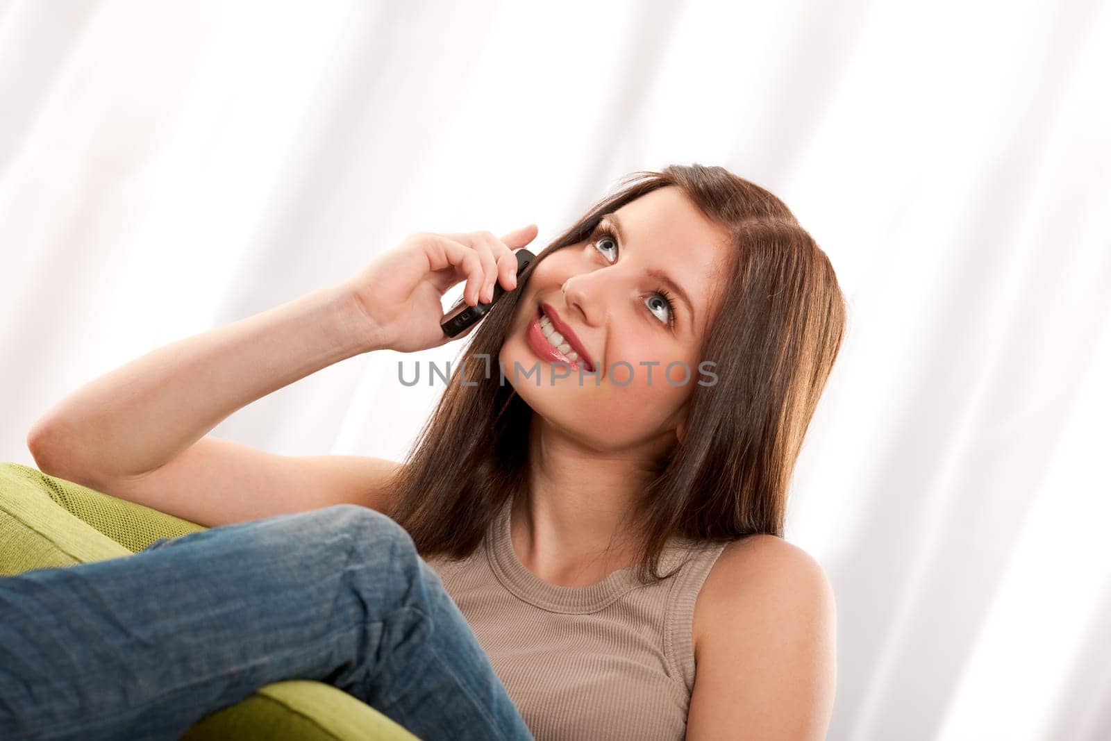 Young brunette with mobile phone