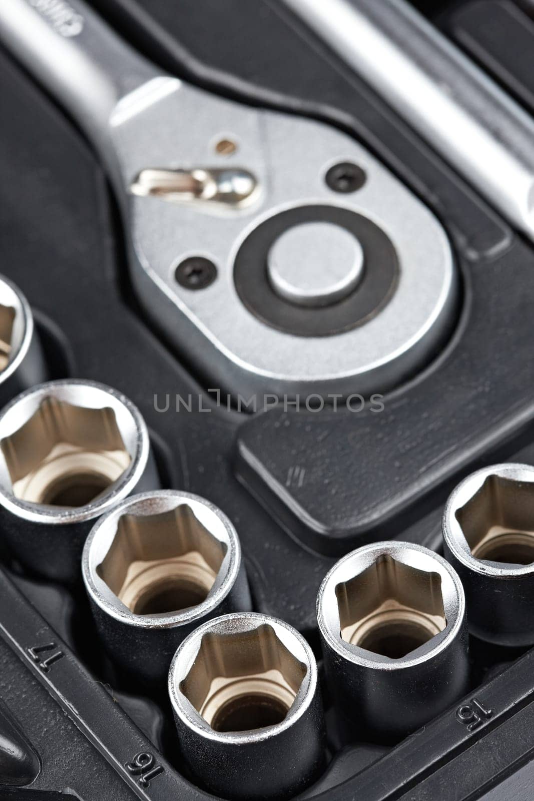 Socket wrench toolbox background. Shallow depth of field