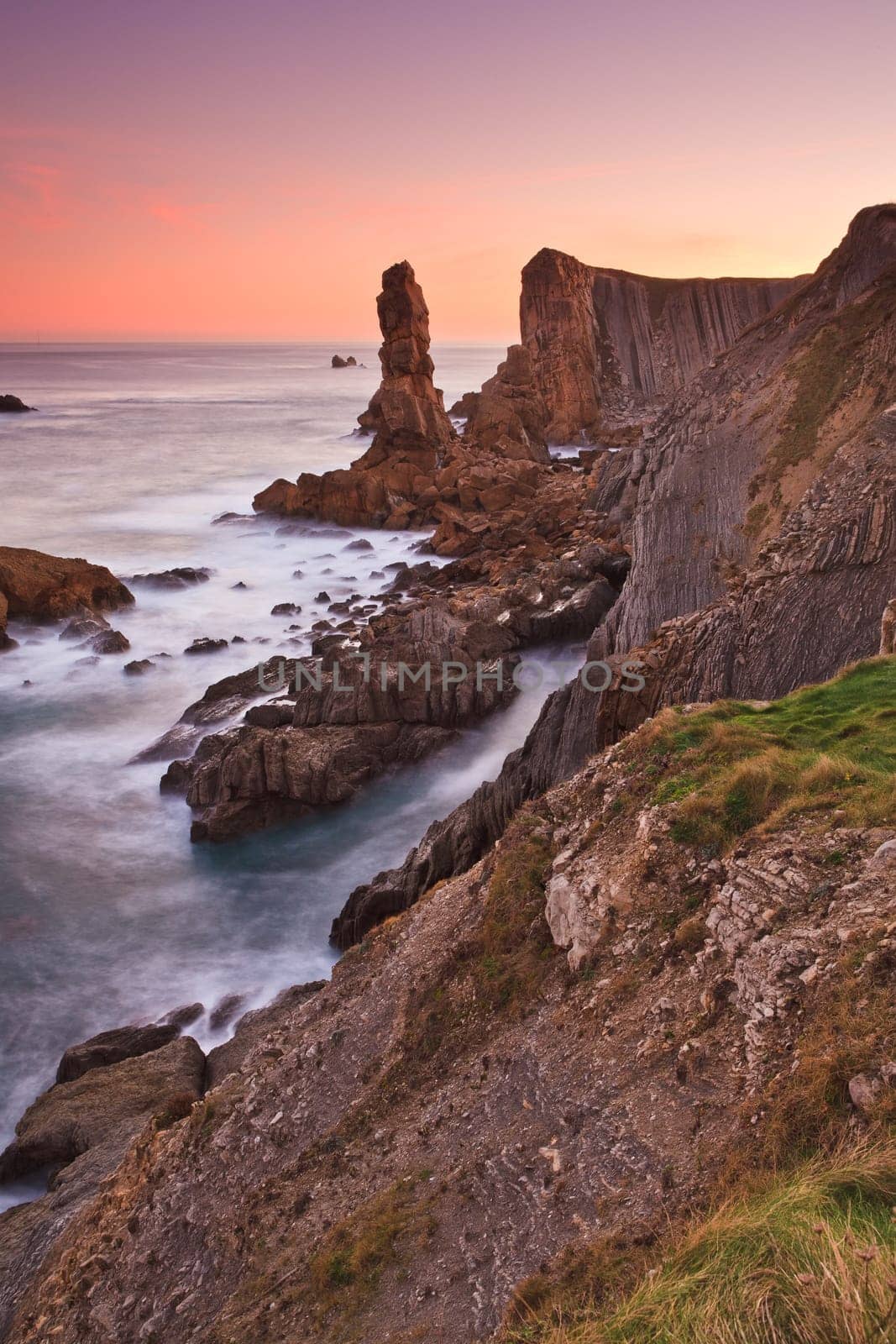 Amazing seascape sunrise at winter. Los Urros, Spain