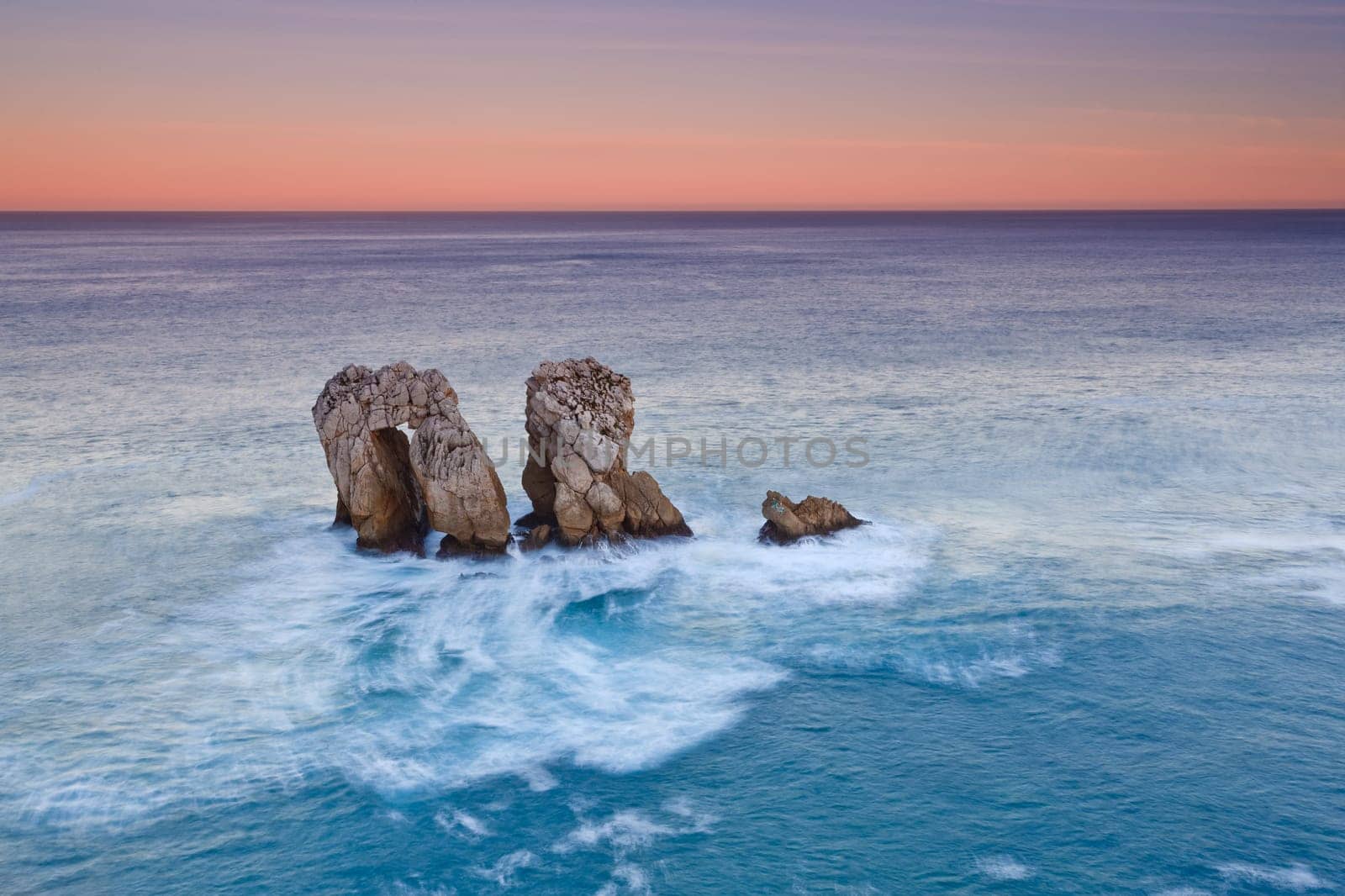Amazing seascape sunrise at winter. Los Urros, Spain