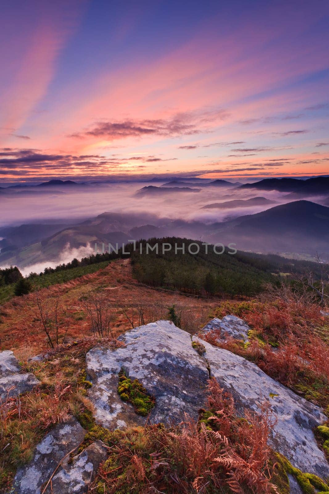 Mountains over the fog in the winter sunrise, Bizkaia, Spain