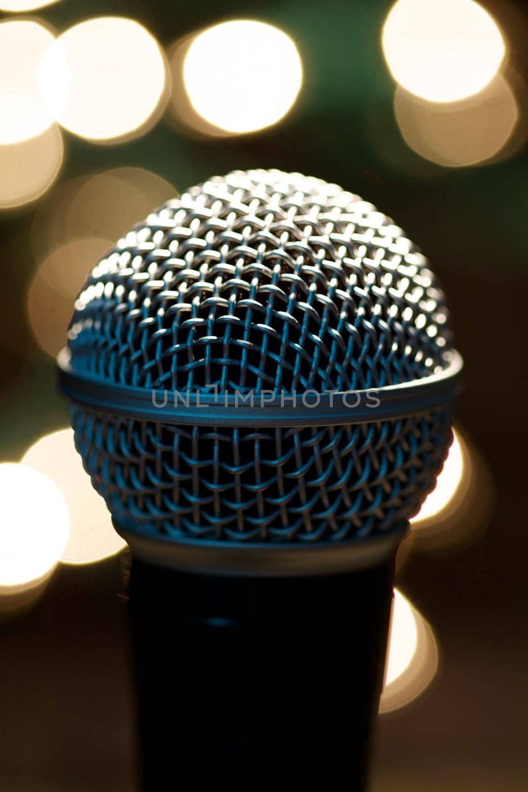 On stage microphone of a popular artist with spot lights