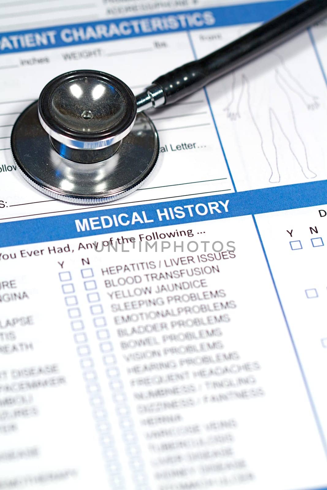 Close up of a Medical History form and a doctor&#039 s Stethoscope