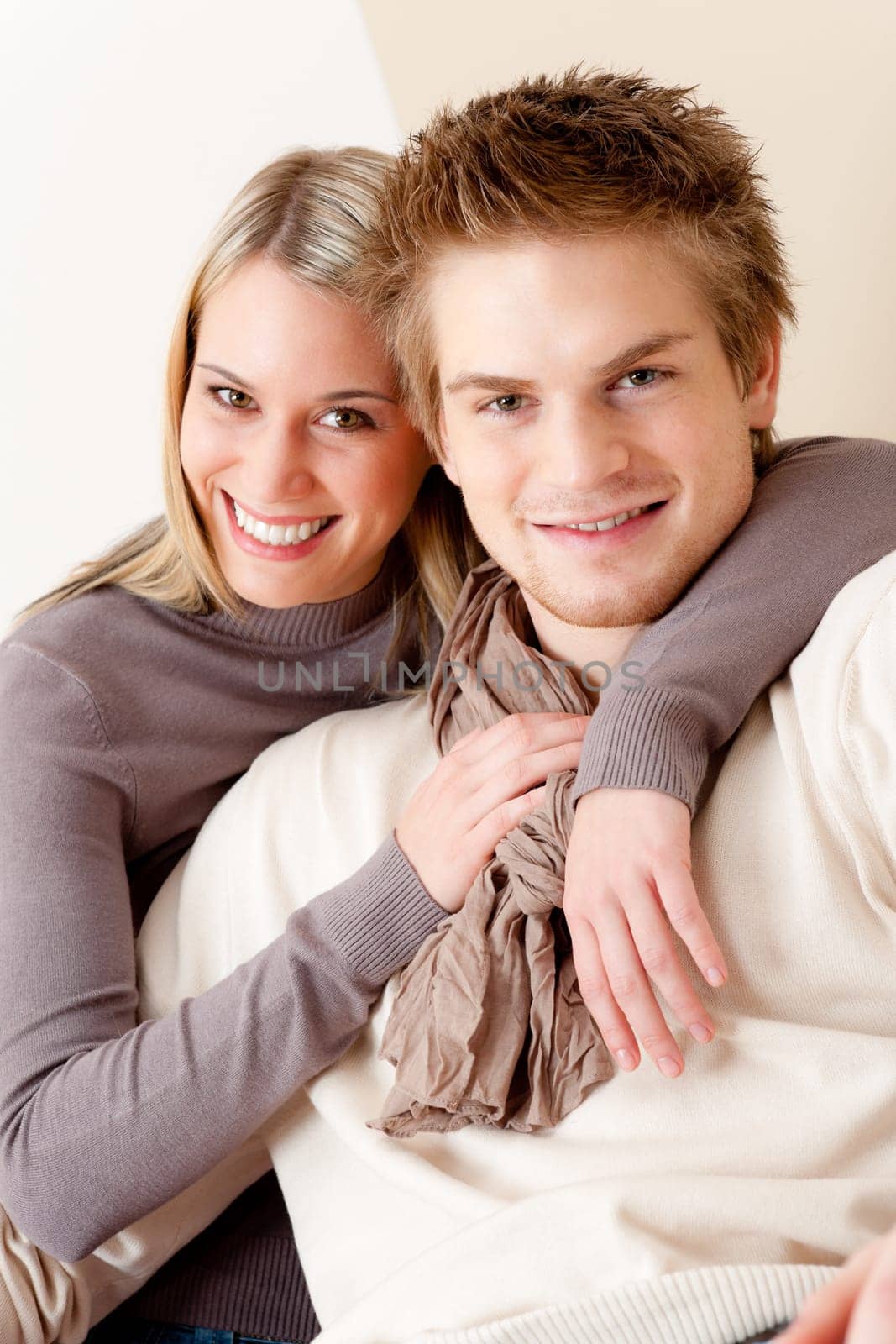 Couple in love - happy relax at home together in living room