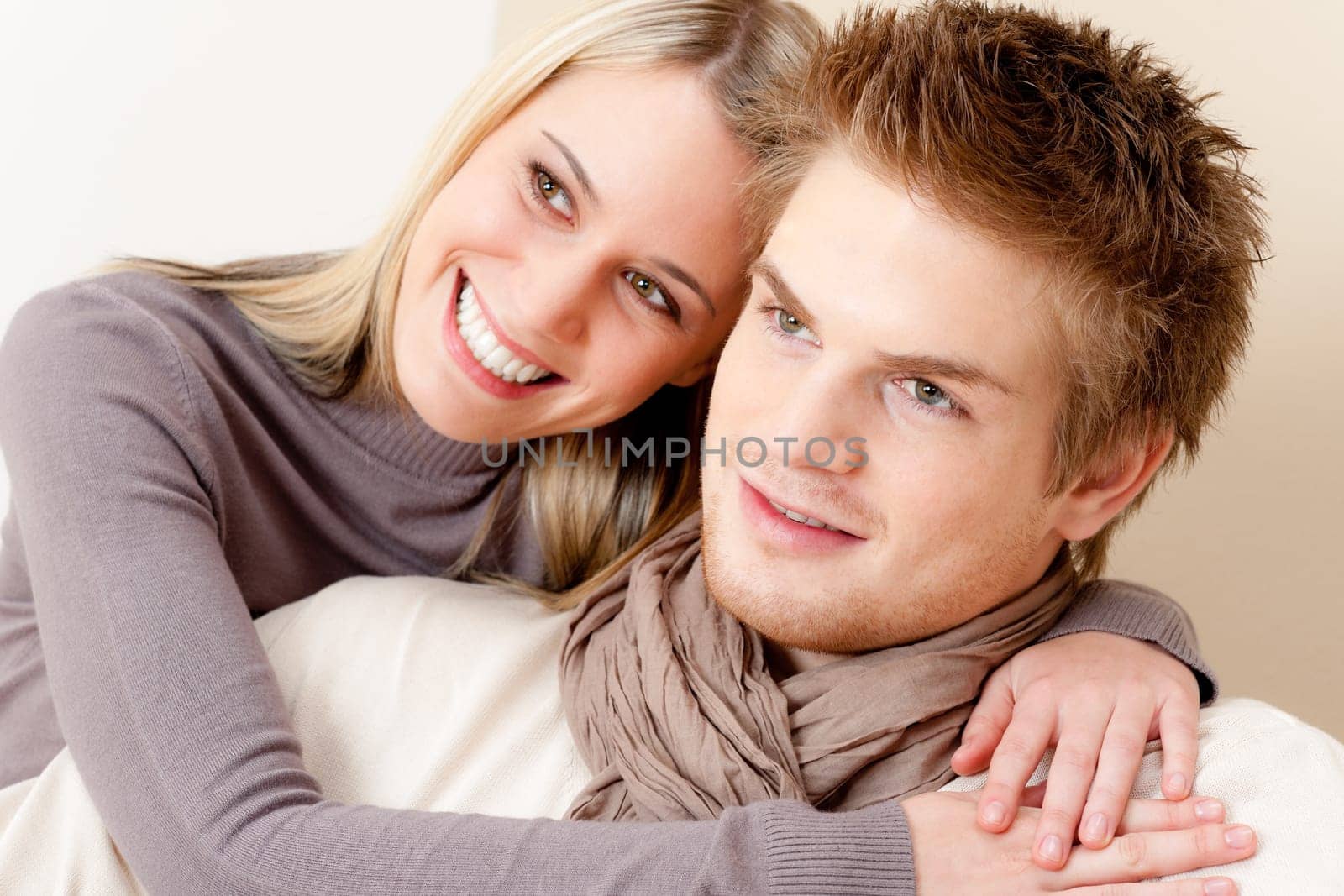 Couple in love - happy relax at home together in living room