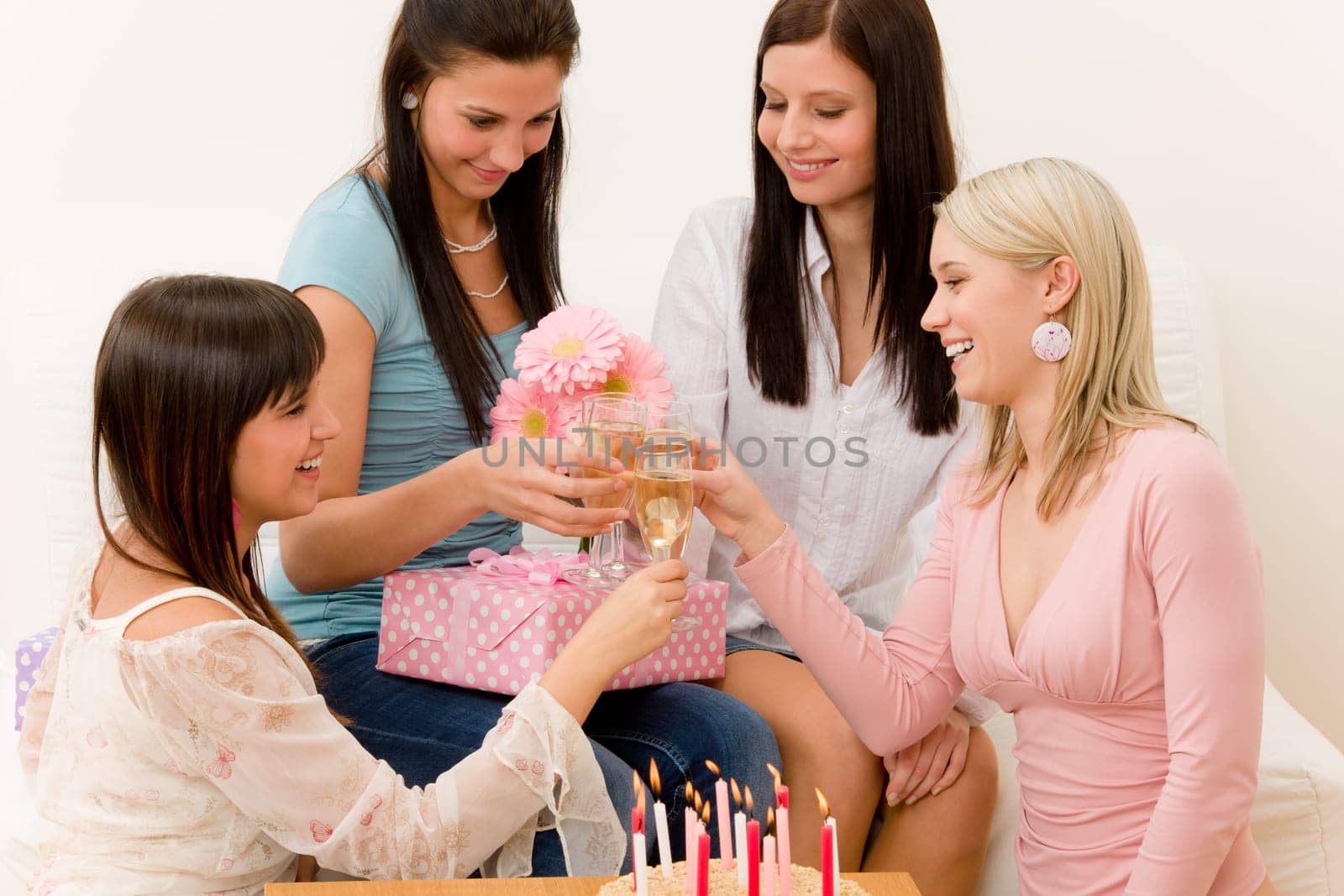 Birthday party - woman getting present and flower, surprise