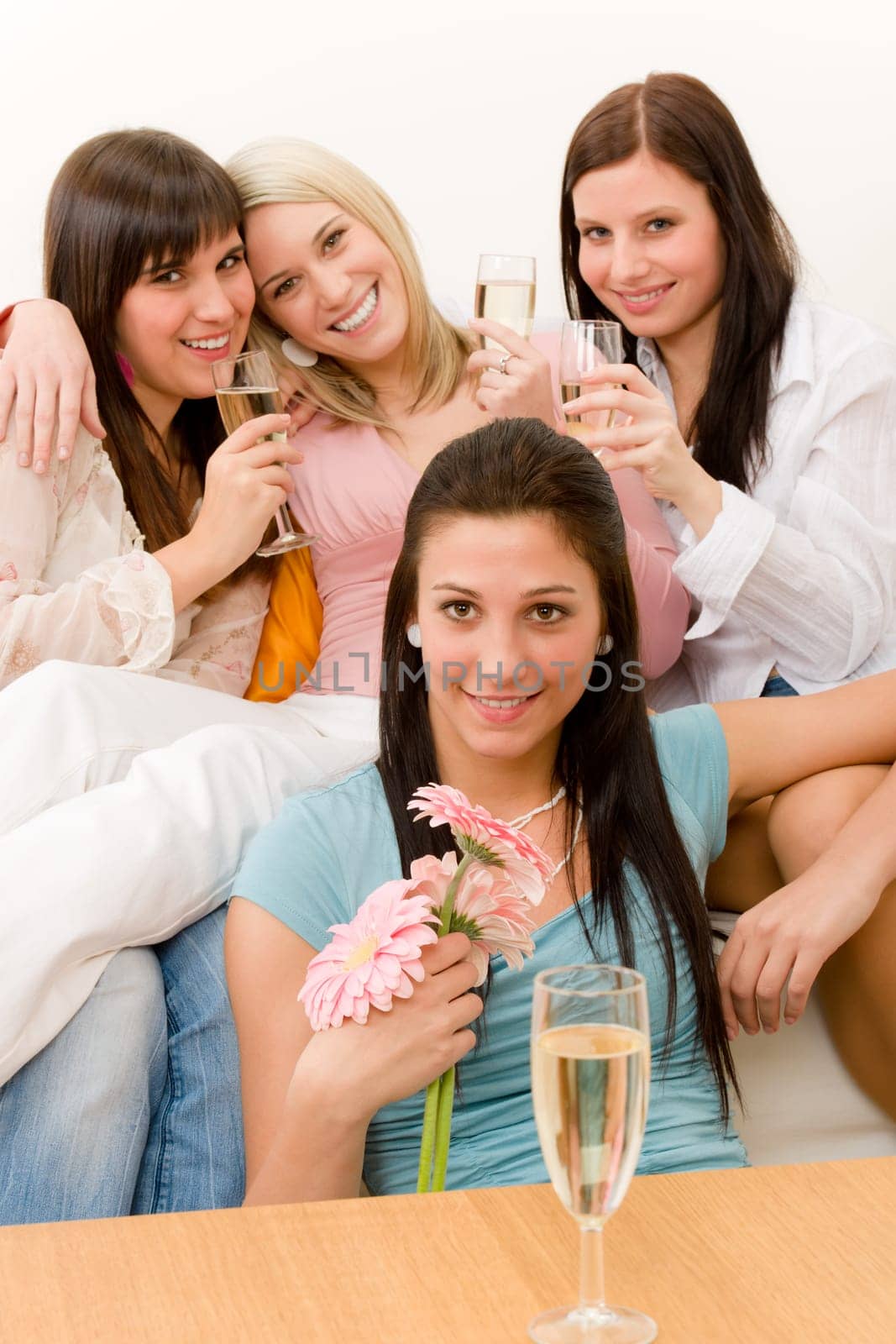 Birthday party - group of woman celebrate with champagne