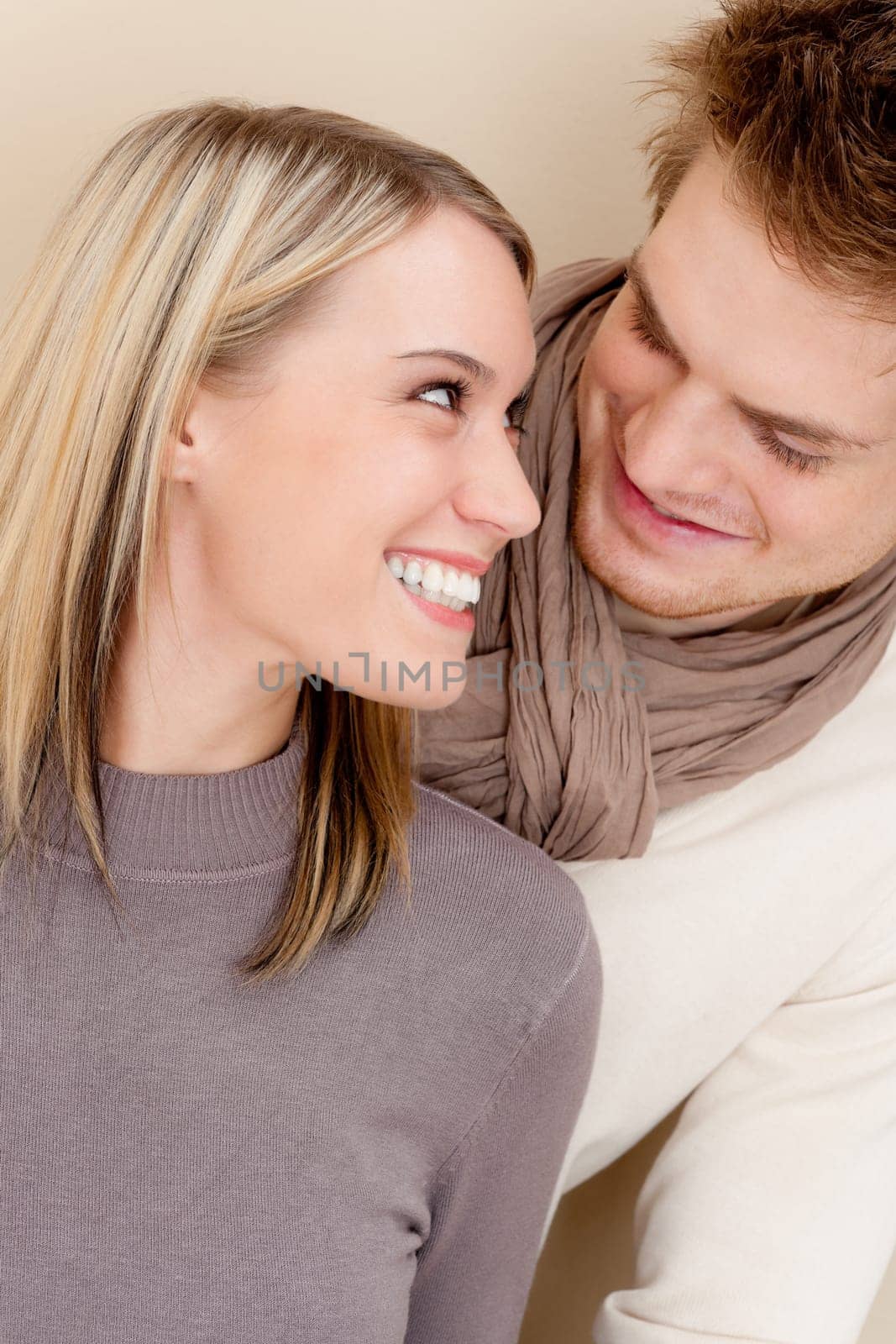 Couple in love - happy relax at home together in living room