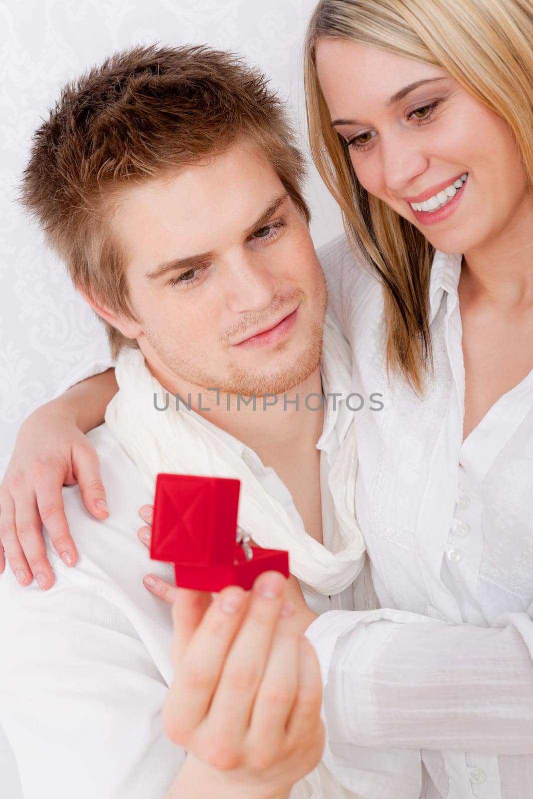 Couple in love - getting engagement ring, romantic