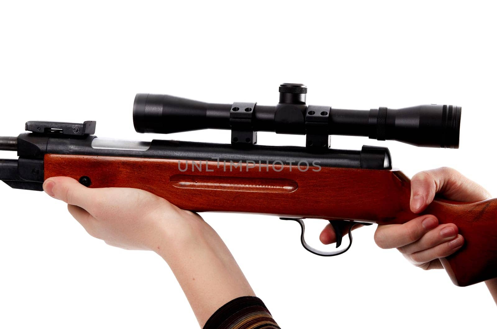 Rifle with optical sight on white