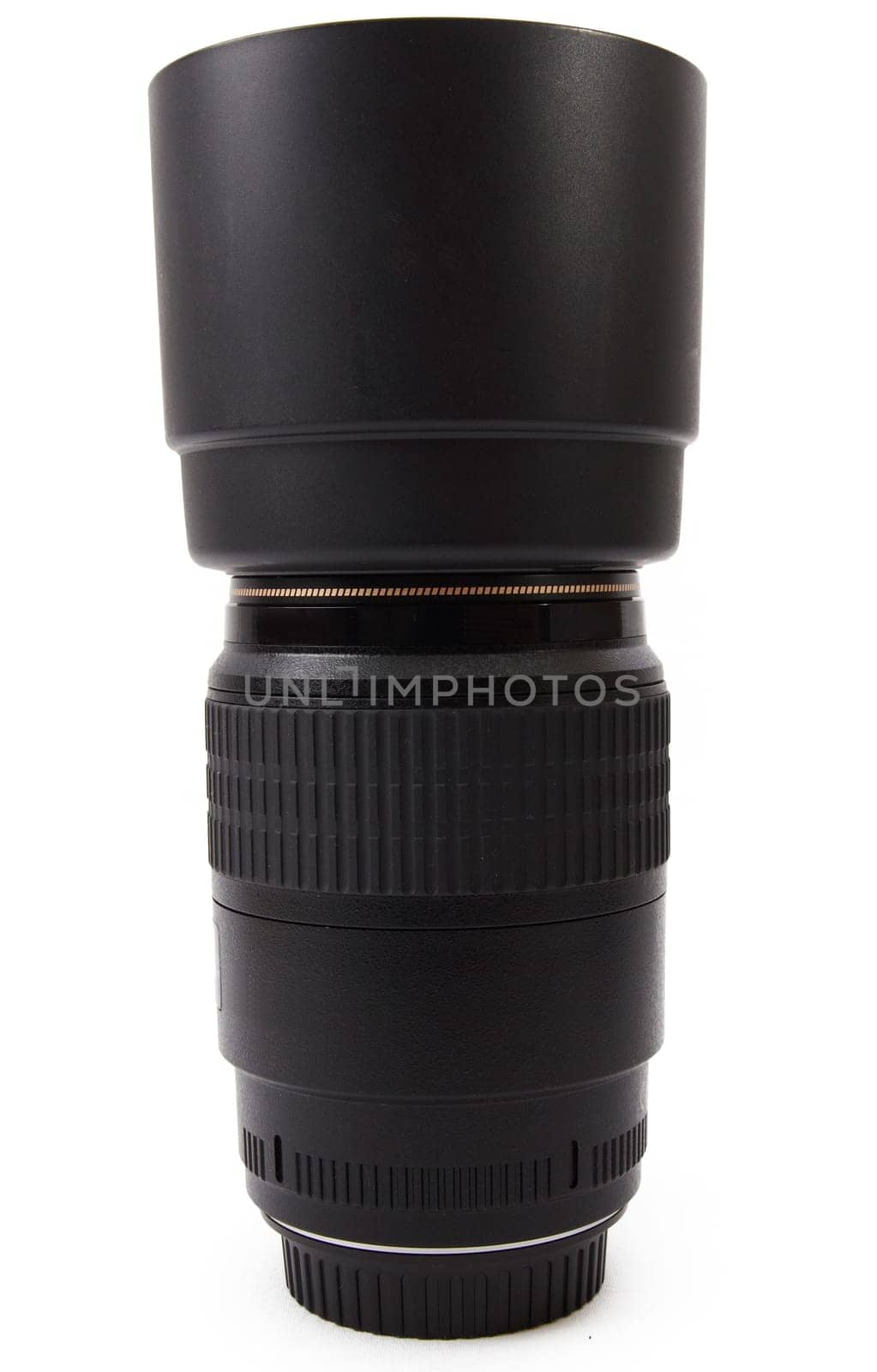 Camera lense, lense hood and lense cap on white background