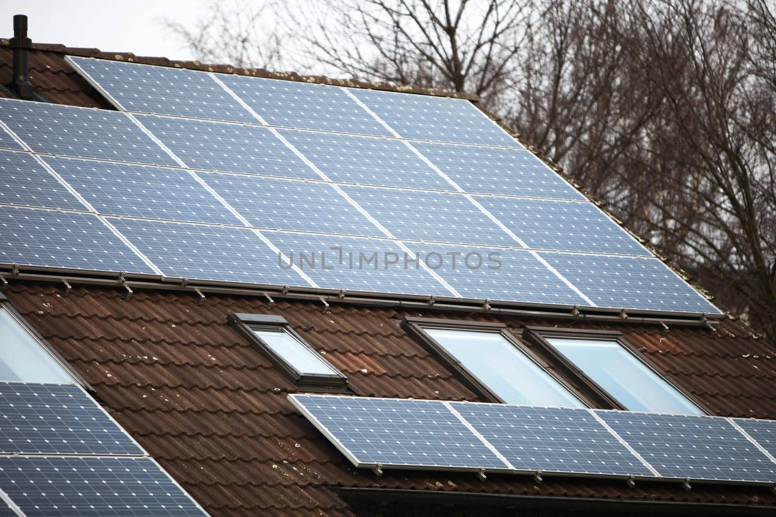 Solar panels on a house with skylights
