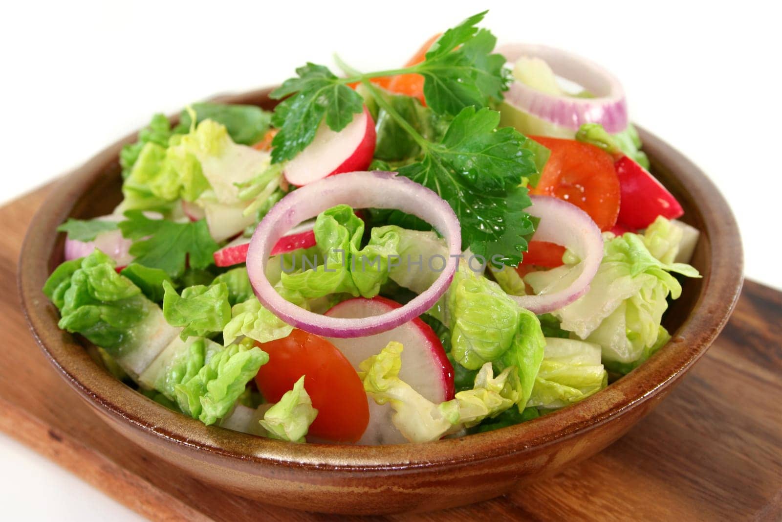 mixed salad with lettuce hearts,tomato and radishes
