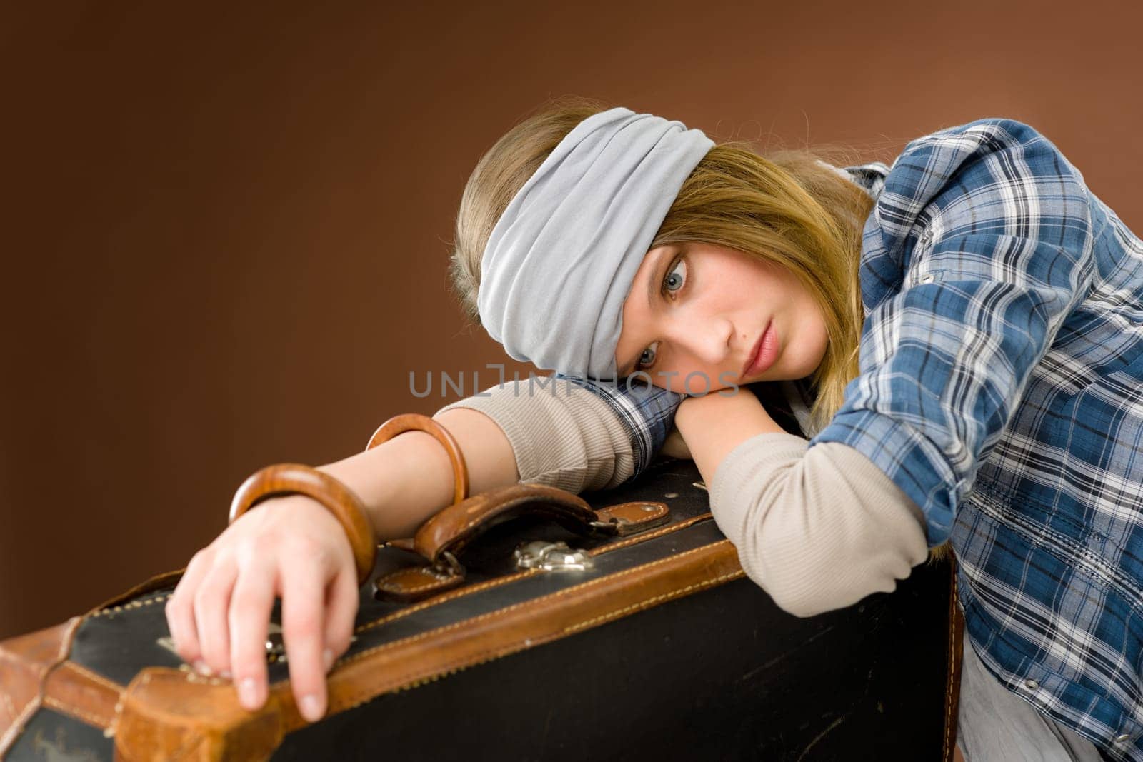Fashion model - young woman posing in country style clothes