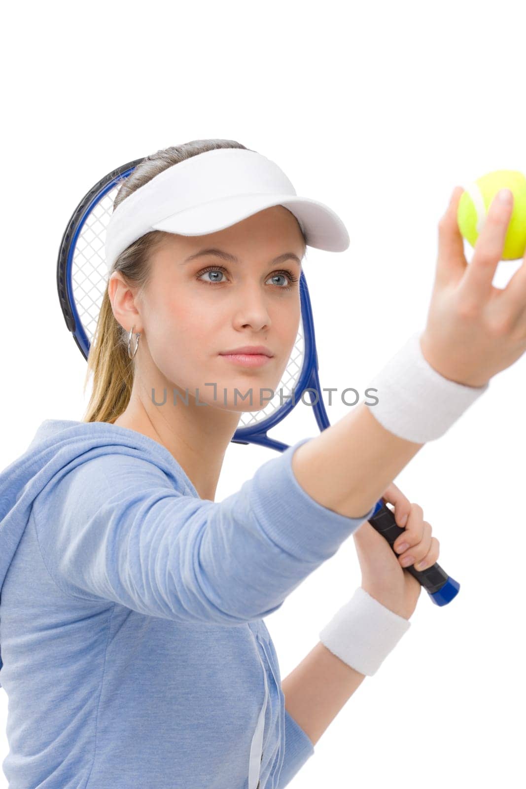 Tennis player - young woman holding racket in fitness outfit