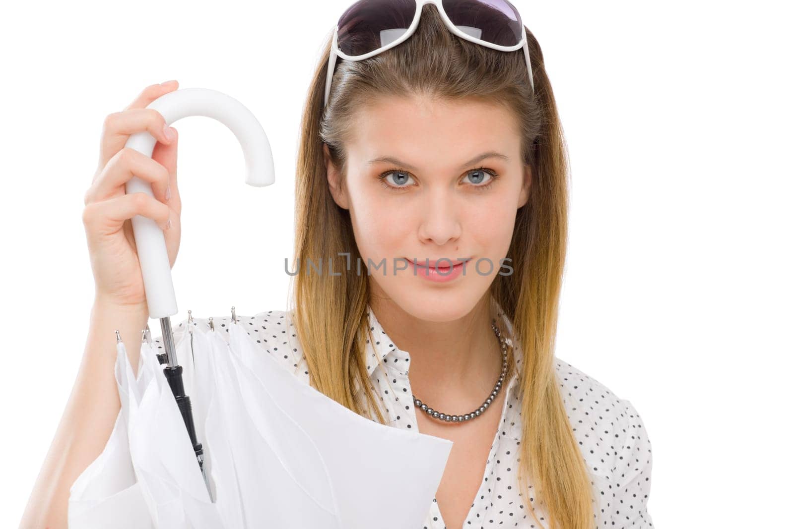 Fashion model - young woman hold umbrella in summer designer clothes