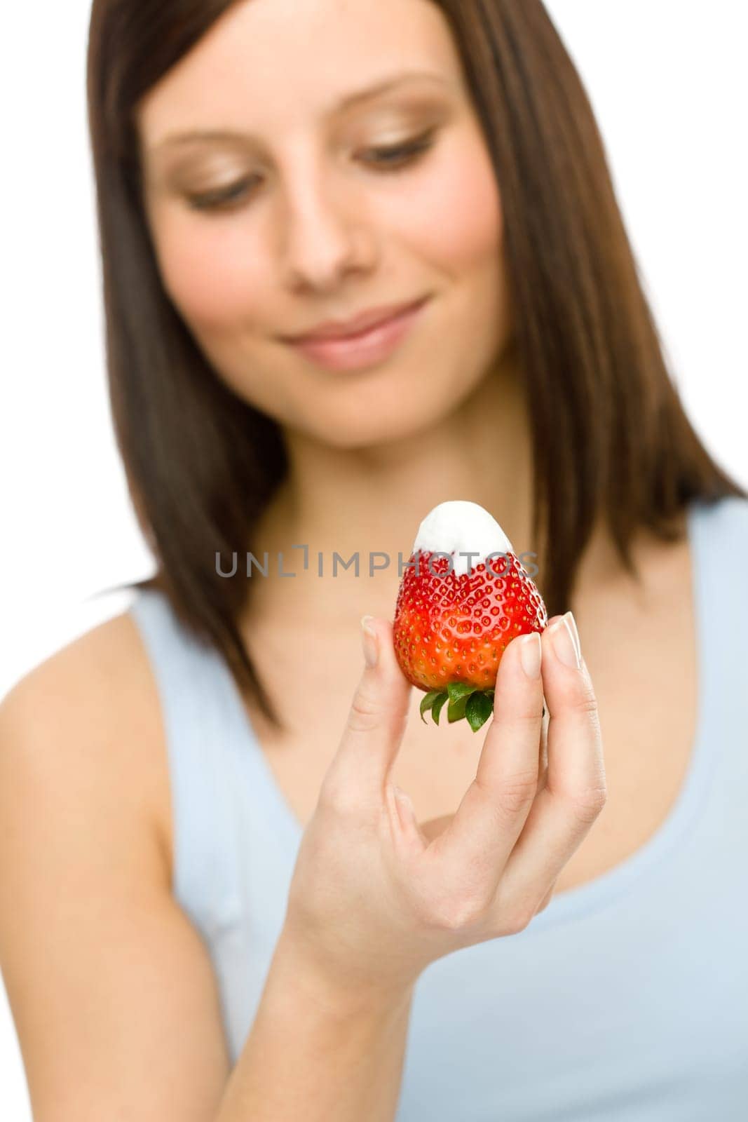 Healthy lifestyle - portrait of woman eat strawberry with cream