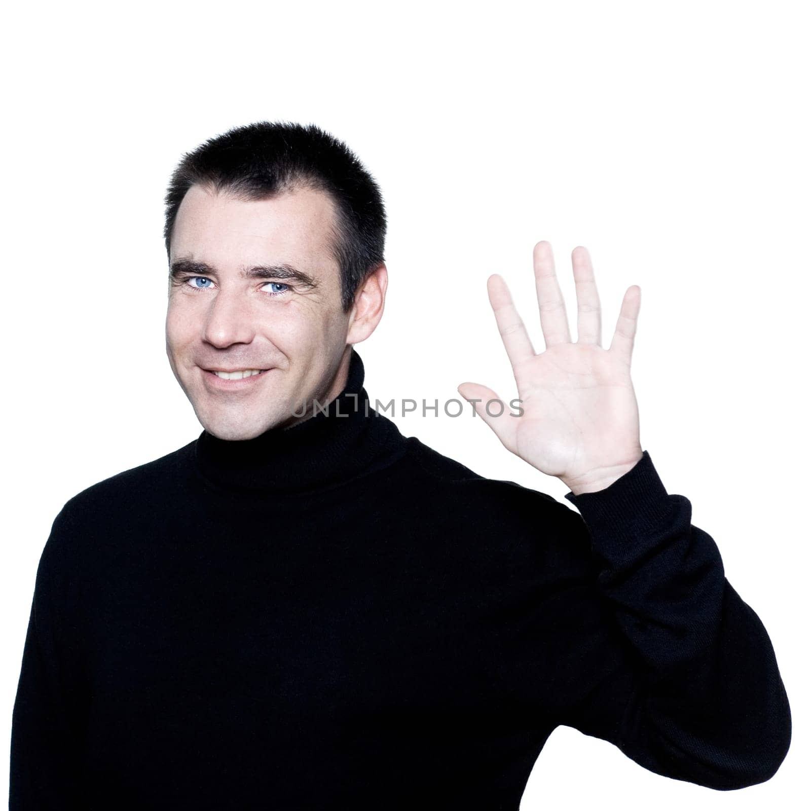 caucasian man smiling saluting greting high-five short brown with polo turtle neck hair blue eyes portrait expressing portrait on studio isolated white background