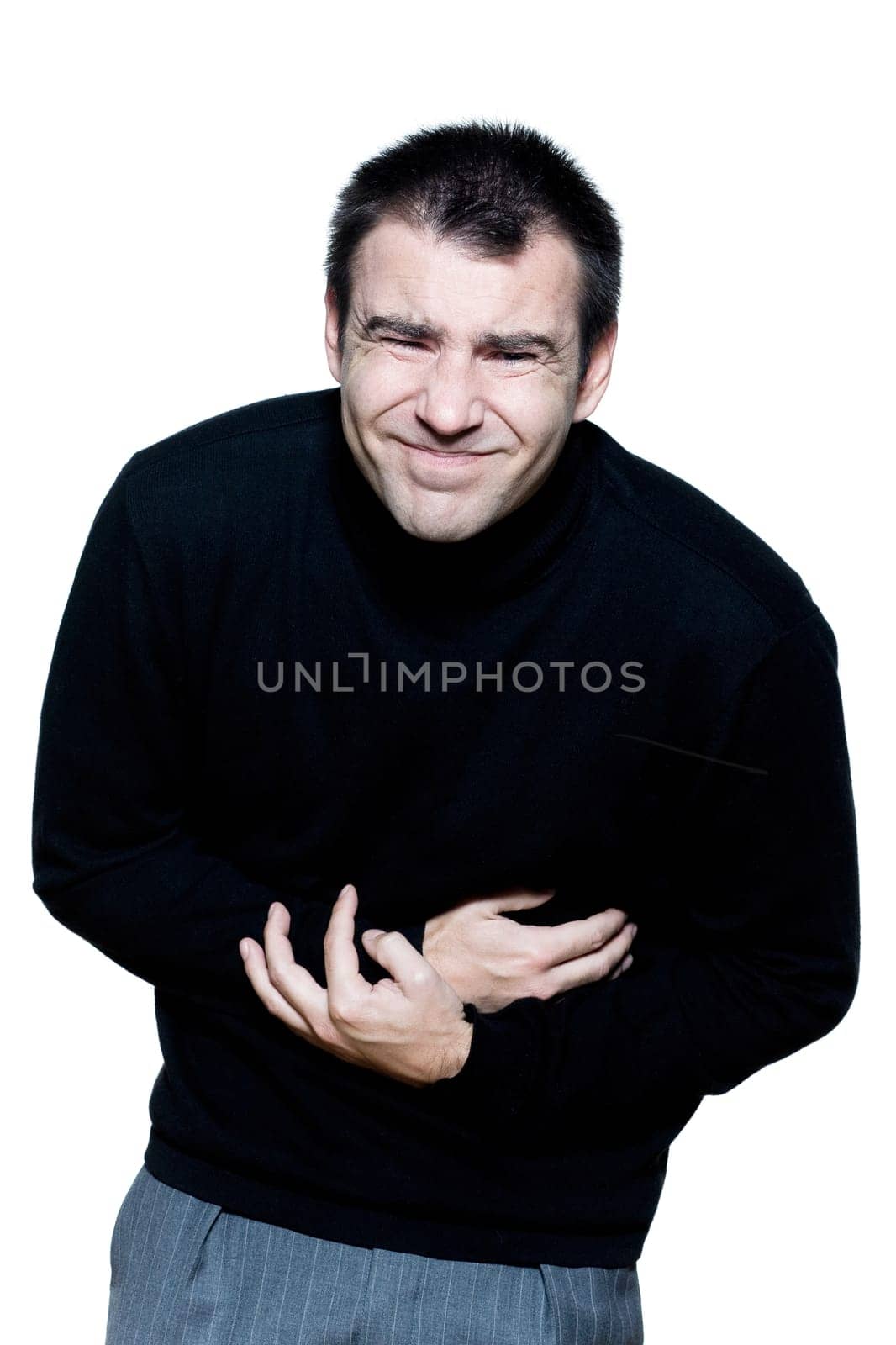 caucasian man portrait stomachache cramp illlness portrait on studio isolated white background