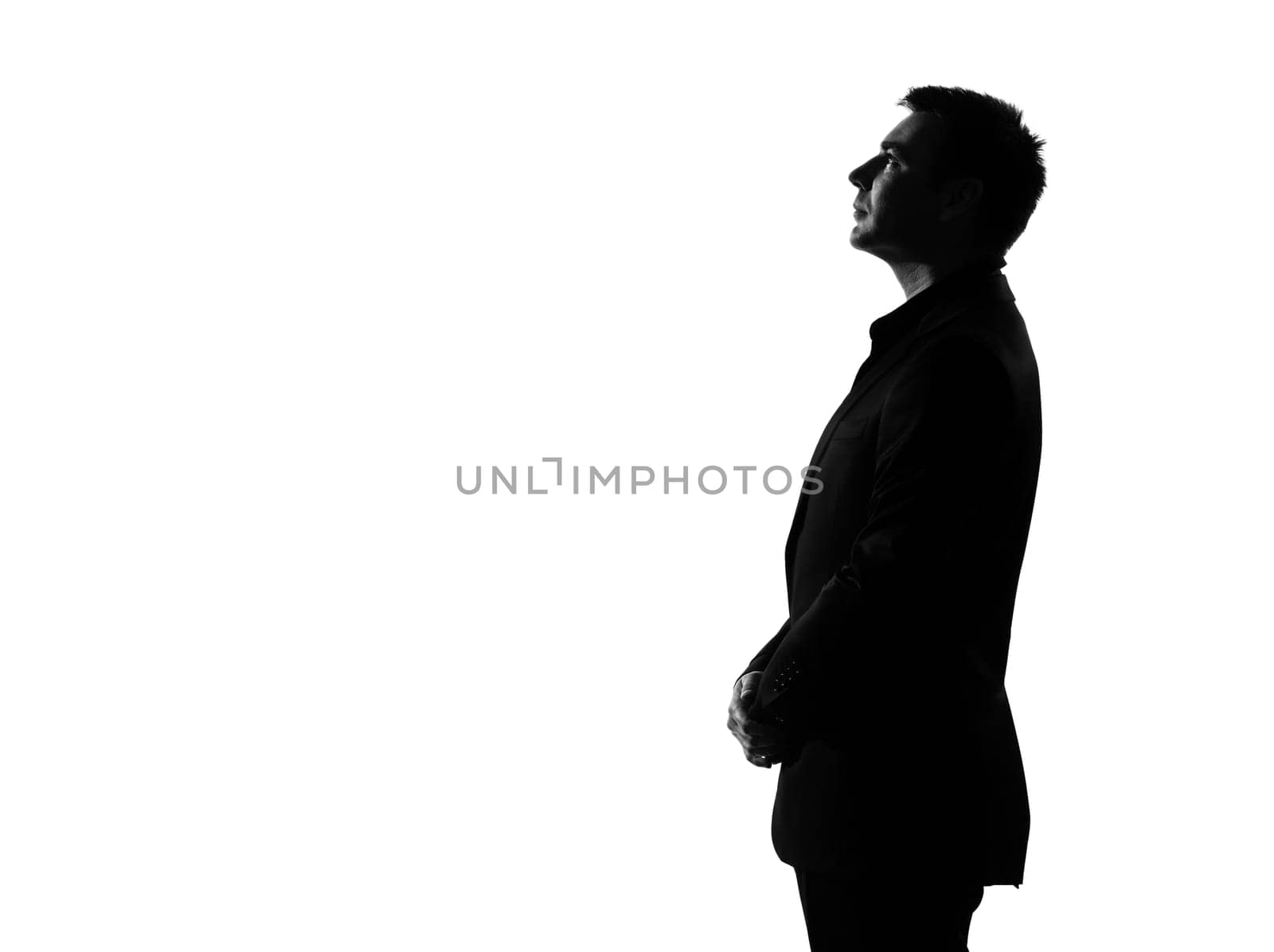 silhouette caucasian business man   profile serious looking up expressing behavior full length on studio isolated white background