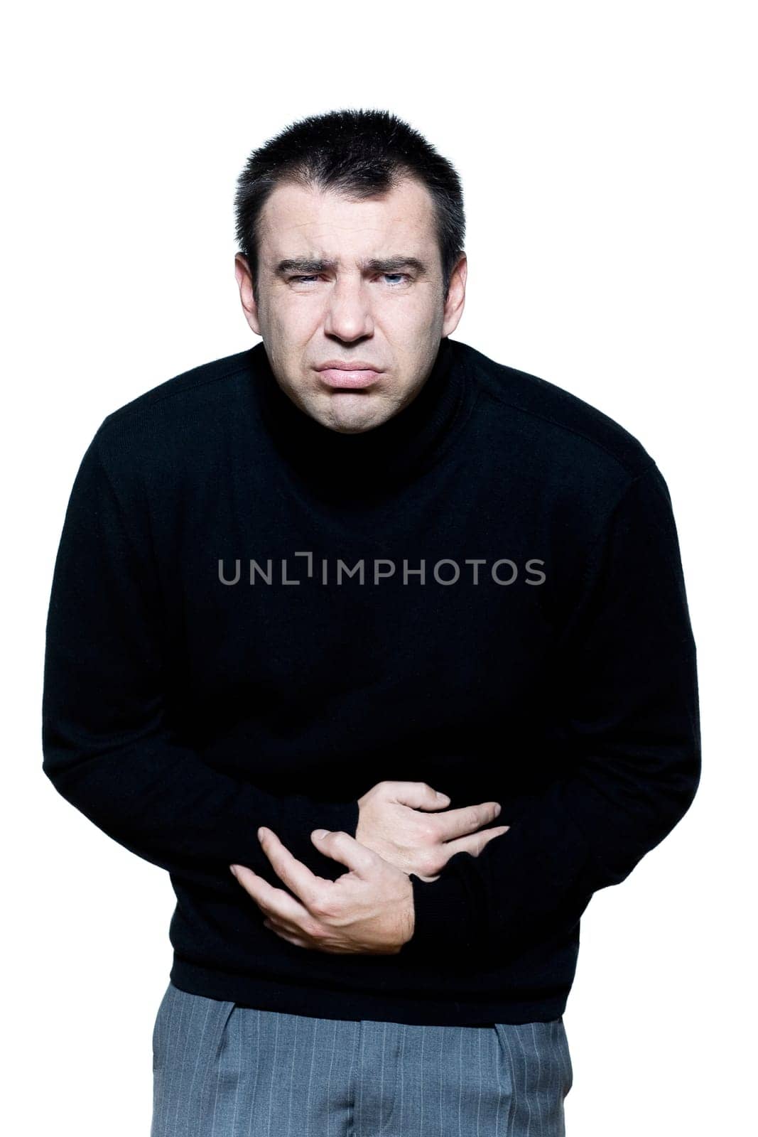 caucasian man portrait stomachache cramp illlness portrait on studio isolated white background