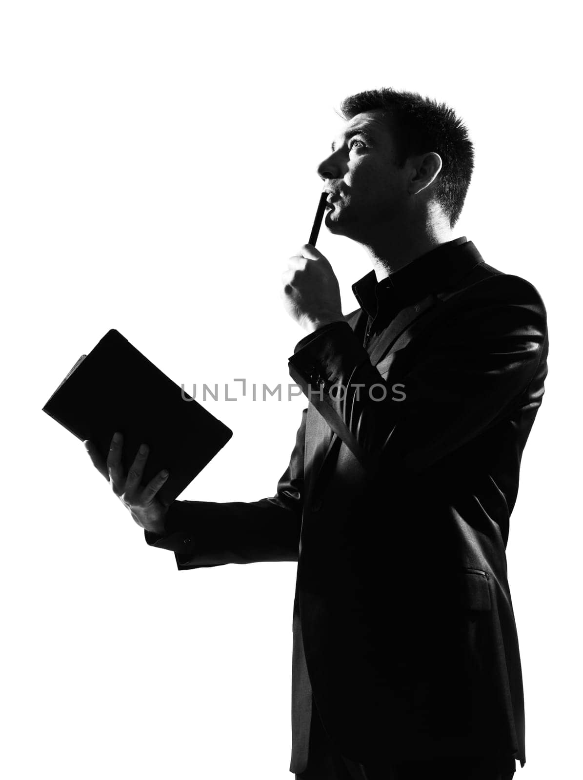 silhouette caucasian business man with note pad thinking expressing behavior full length on studio isolated white background
