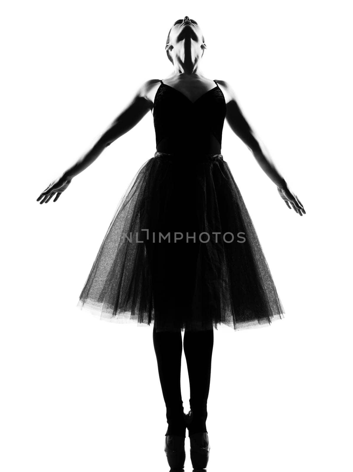 beautiful caucasian tall woman ballet dancer standing tiptoe pose  full length on studio isolated white background
