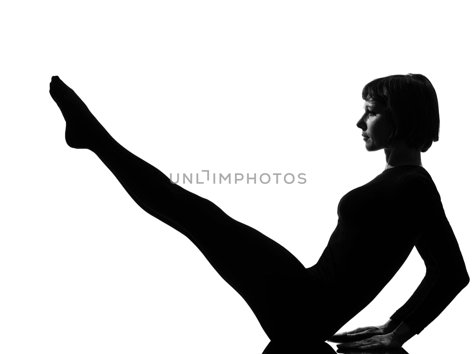woman paripurna navasana boat pose yoga posture position in silouhette on studio white background