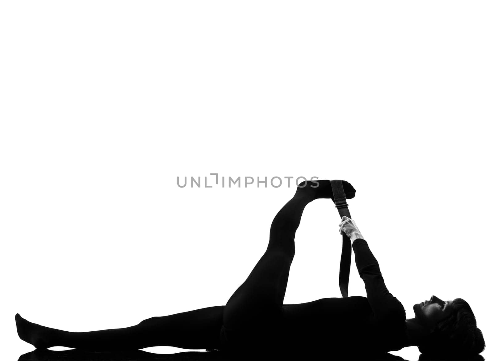 woman supta padangusthasana 2  Hand To Big Toe Pose posture position in silouhette on studio white background