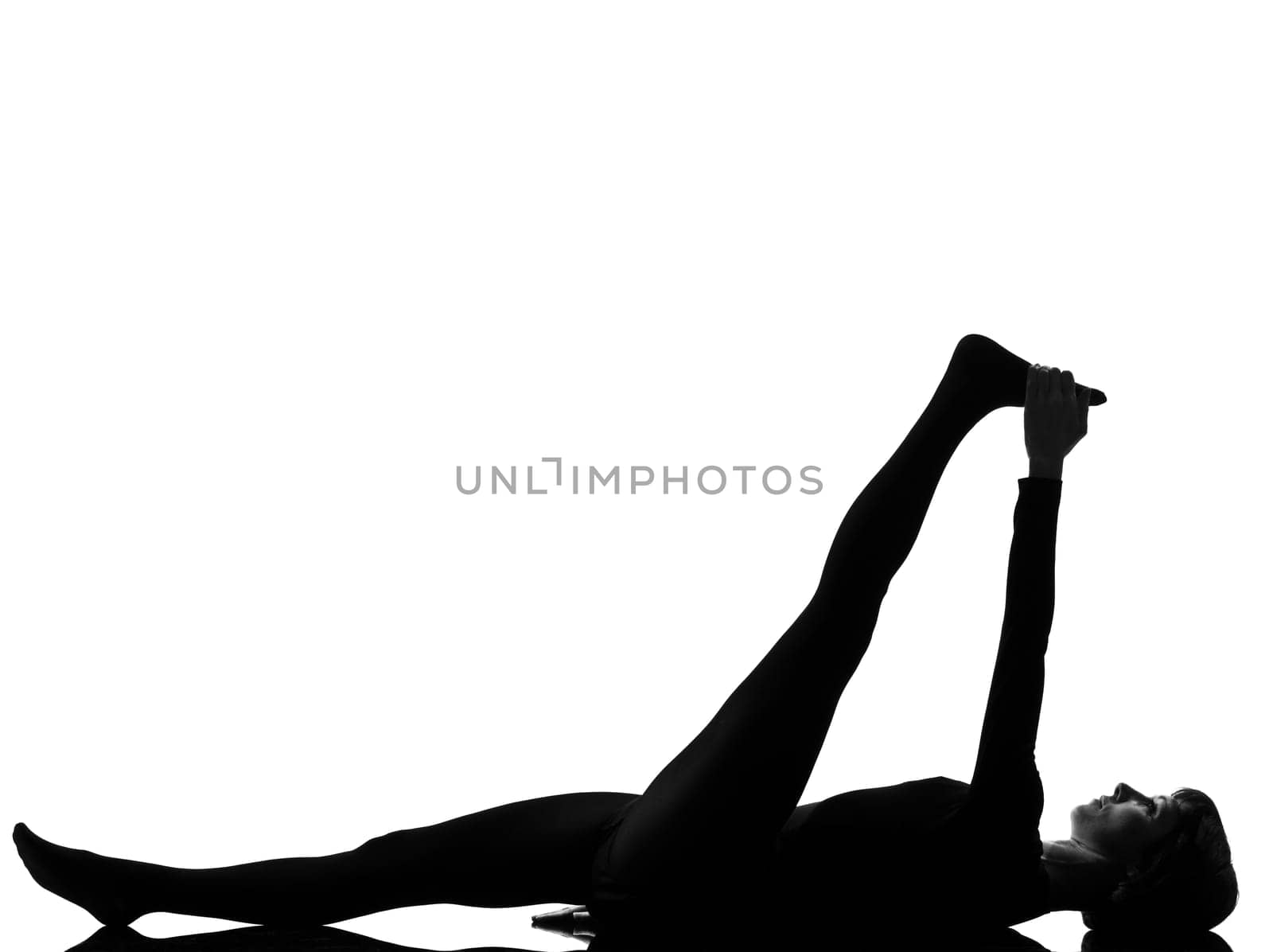 woman supta padangusthasana 1  Hand To Big Toe Pose  posture position in silouhette on studio white background