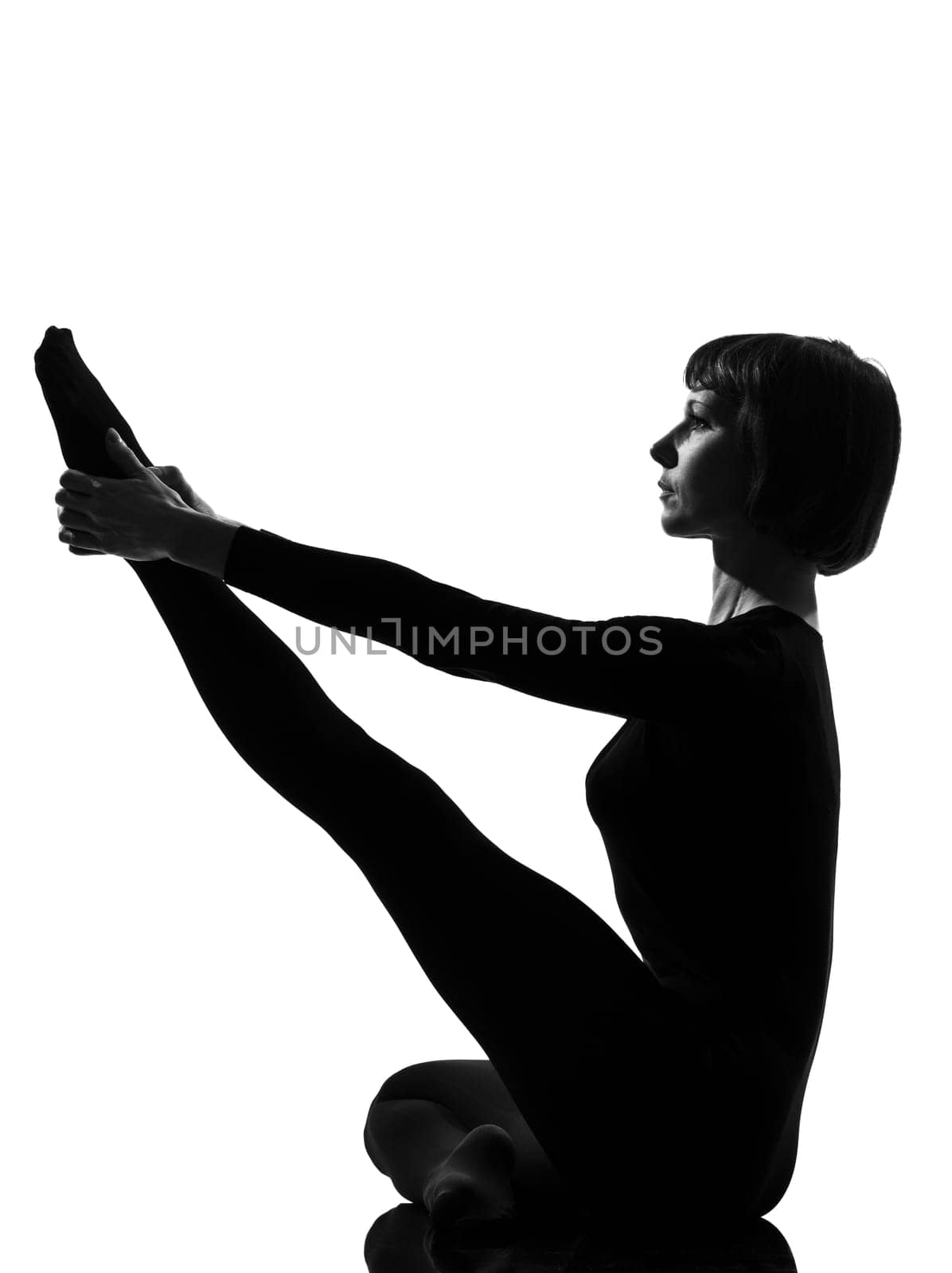 Parivrtta Krounchasana heron pose yoga woman posture position in silouhette on studio white background