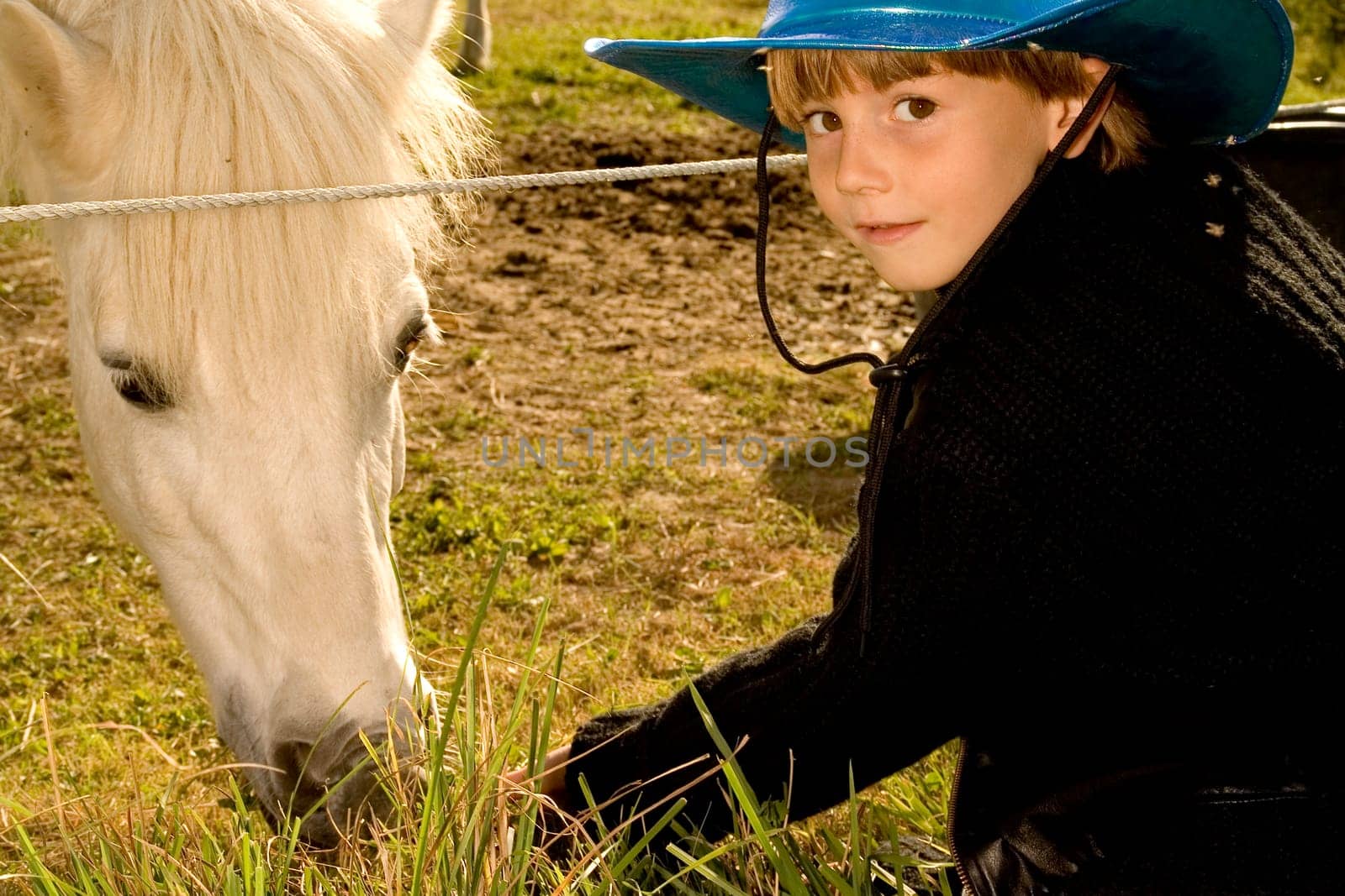 Boy with cowboy hat